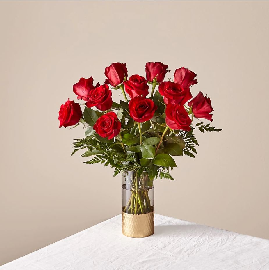 Lovebirds Red Rose Bouquet - The Better Bouquet is about 22"H by 19"W. A fresh bouquet of 24 red roses and foliage. For long–lasting blooms replace water and trim stems daily. The bouquet pictured reflects our original design for this product. While we always try to follow the color palette, we may replace stems to deliver the freshest bouquet possible, and we may sometimes need to use a different vase.