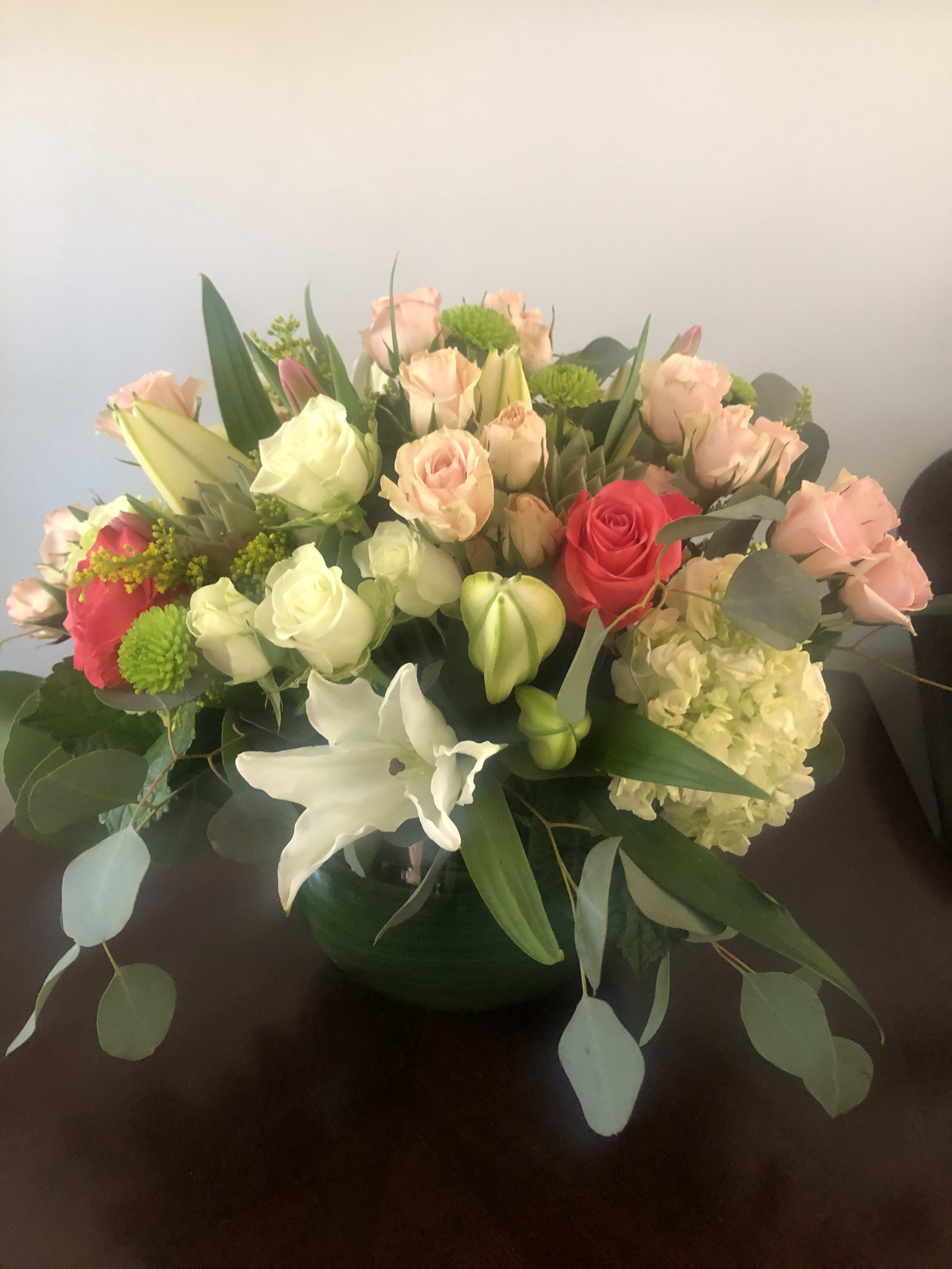 Natures blessings - Spray roses, lilies, and hydrangea come together to create this soft expression of spring 