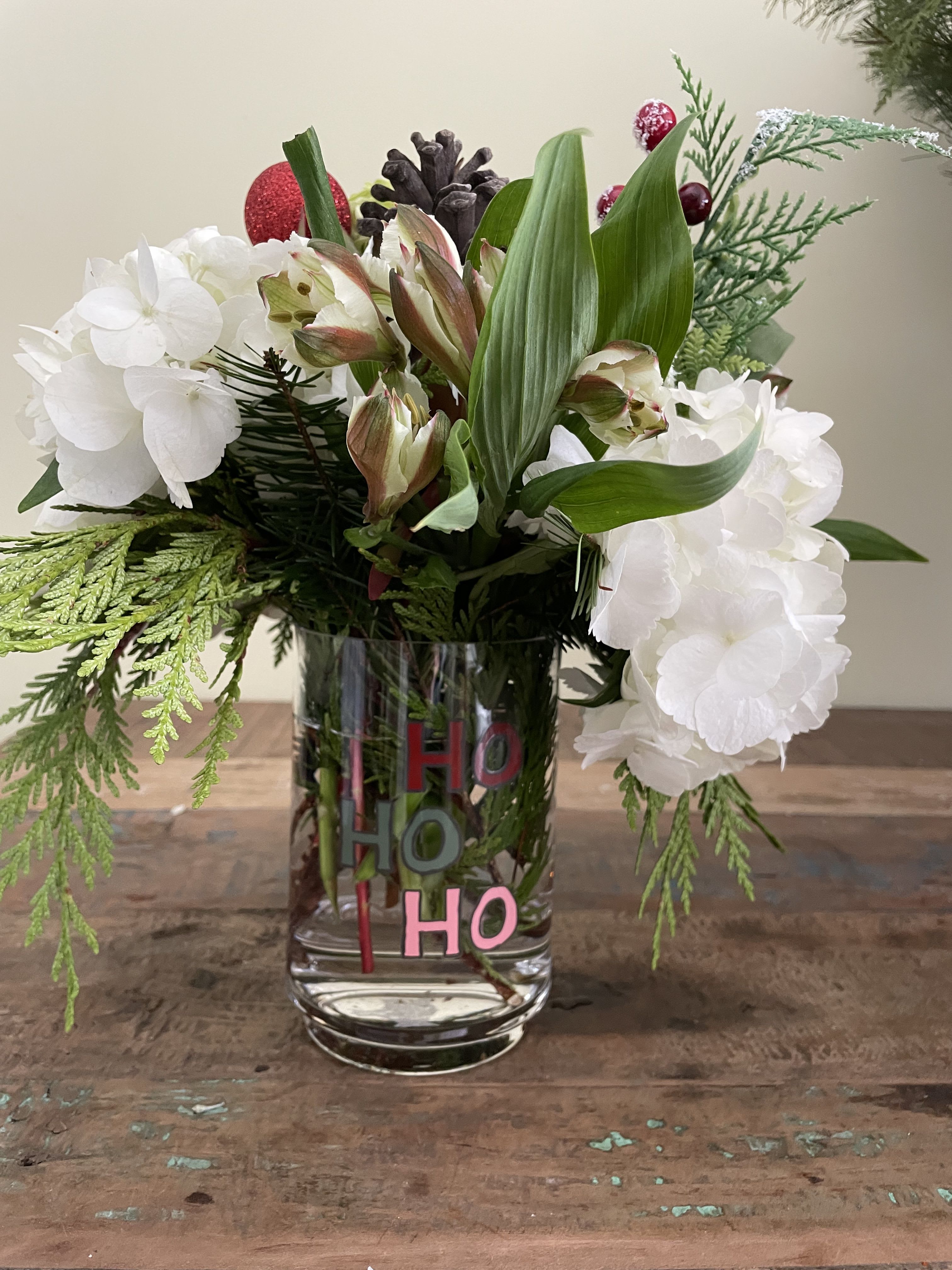 Hohoho - White and green hydrangea, alstromeria, berries and cones