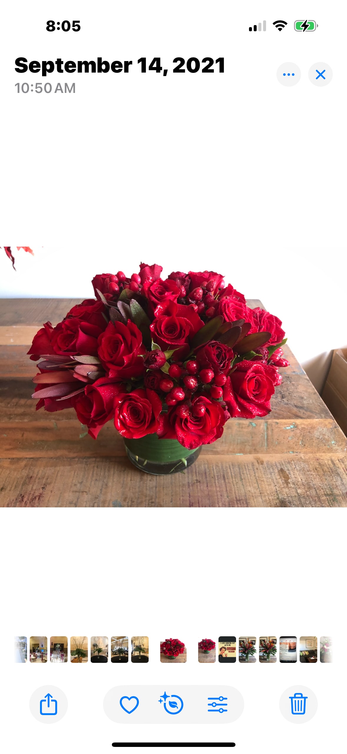 Red rose arrangement in a glass vase