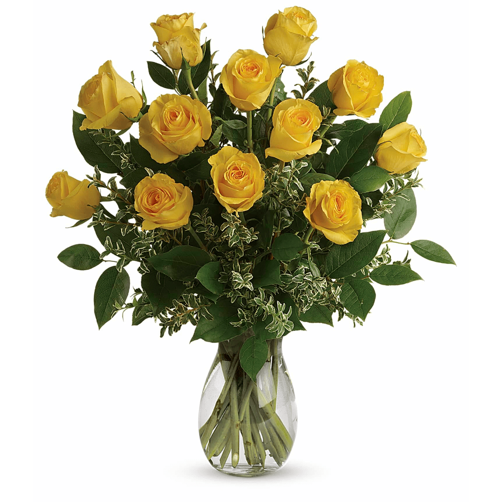 Yellow roses arranged in a clear glass vase