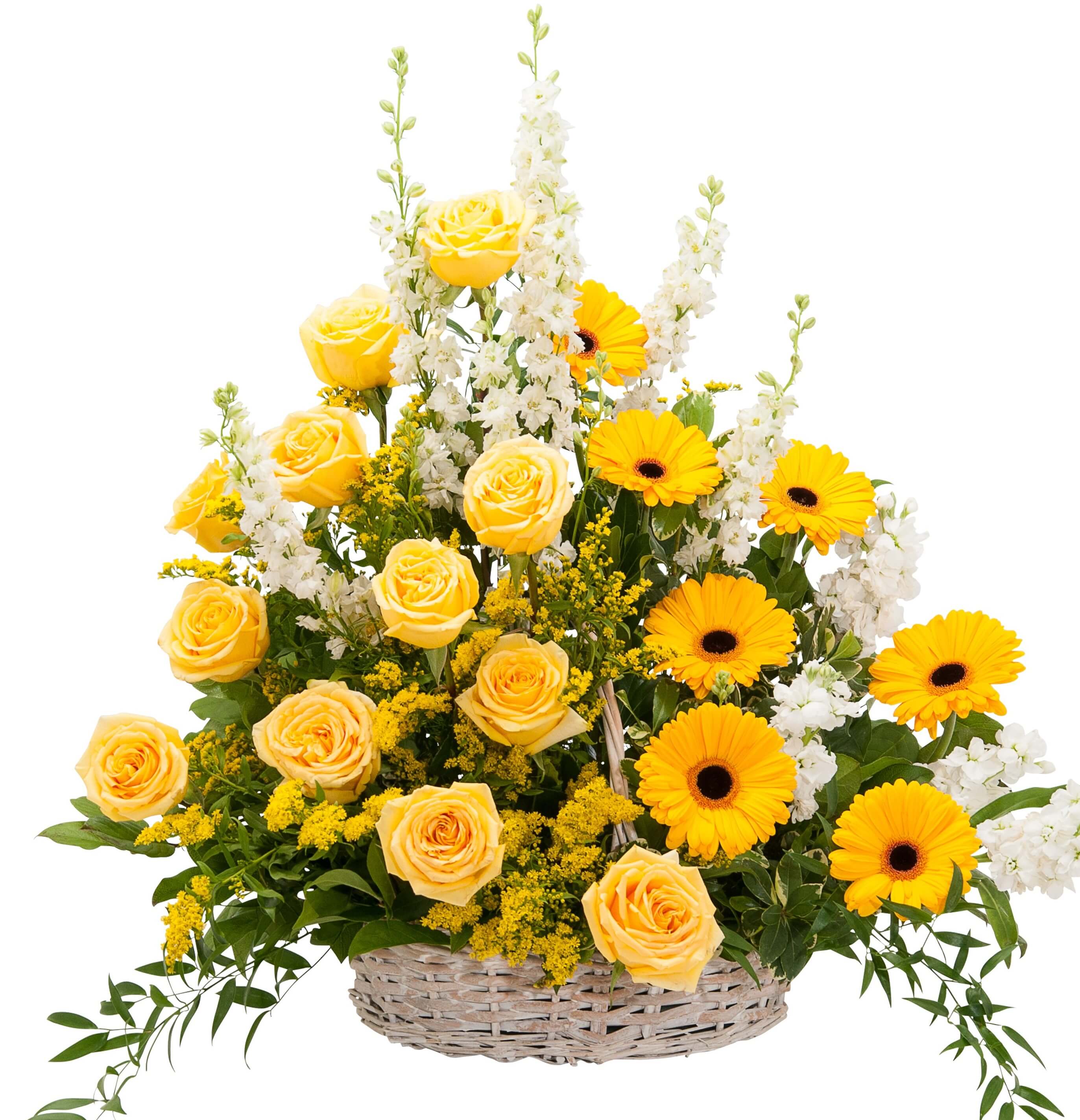 Yellow roses and gerbera daisies in a wicker basket