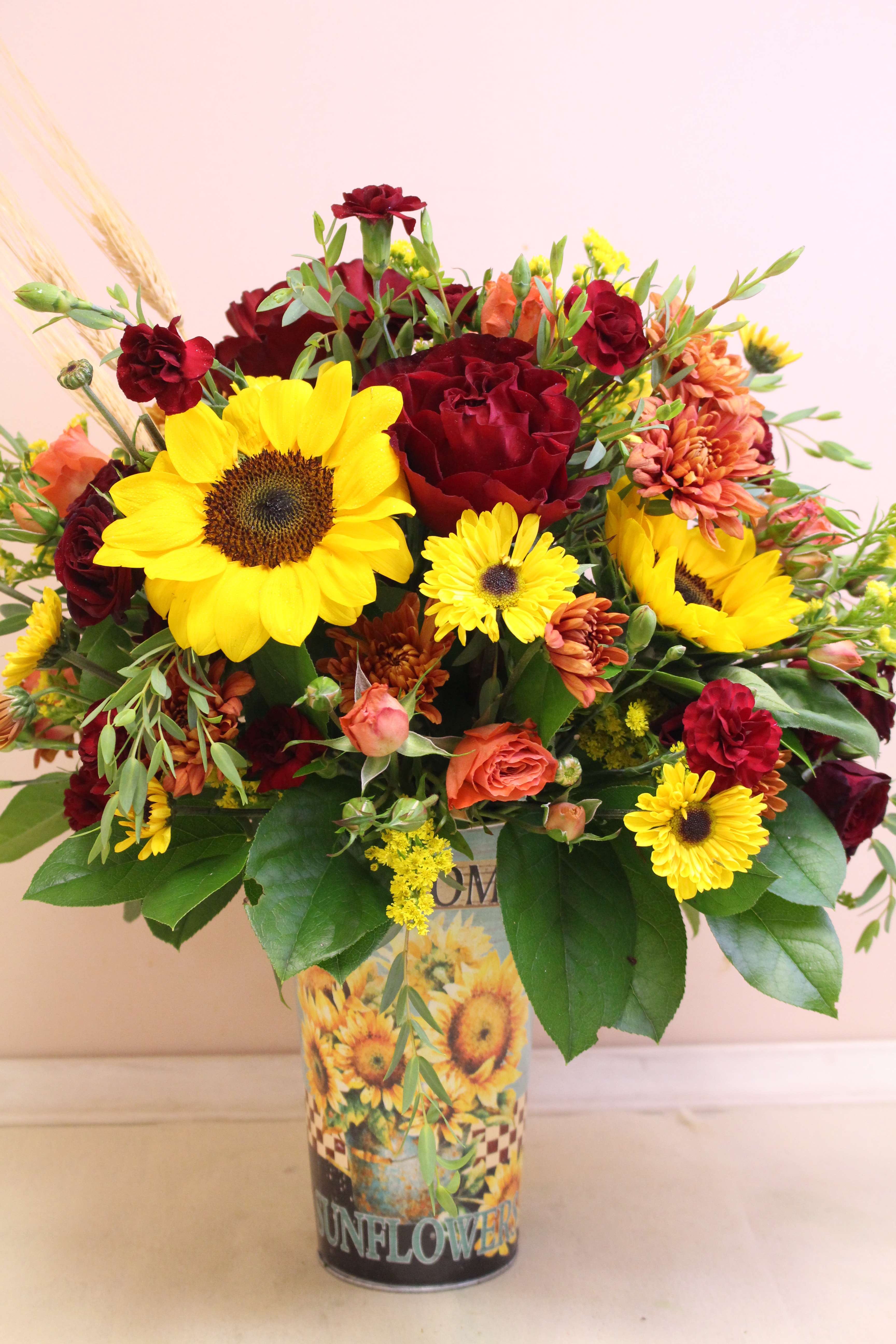 Fall clear skies - A adorable galvanized tin with a fall sunflower day theme.   Filled with an array of fall flowers 