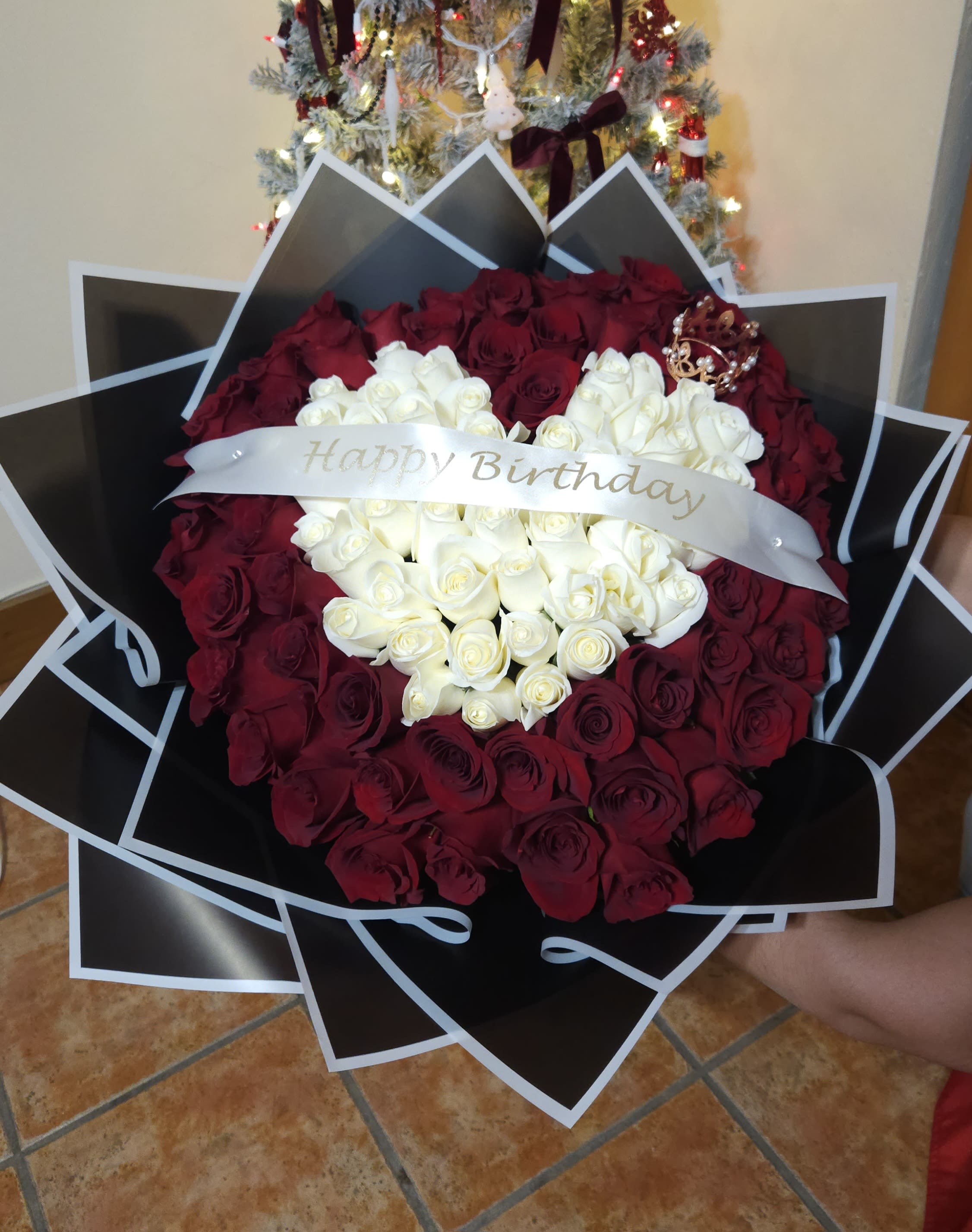 Bouquet of red and white roses with a Happy Birthday ribbon