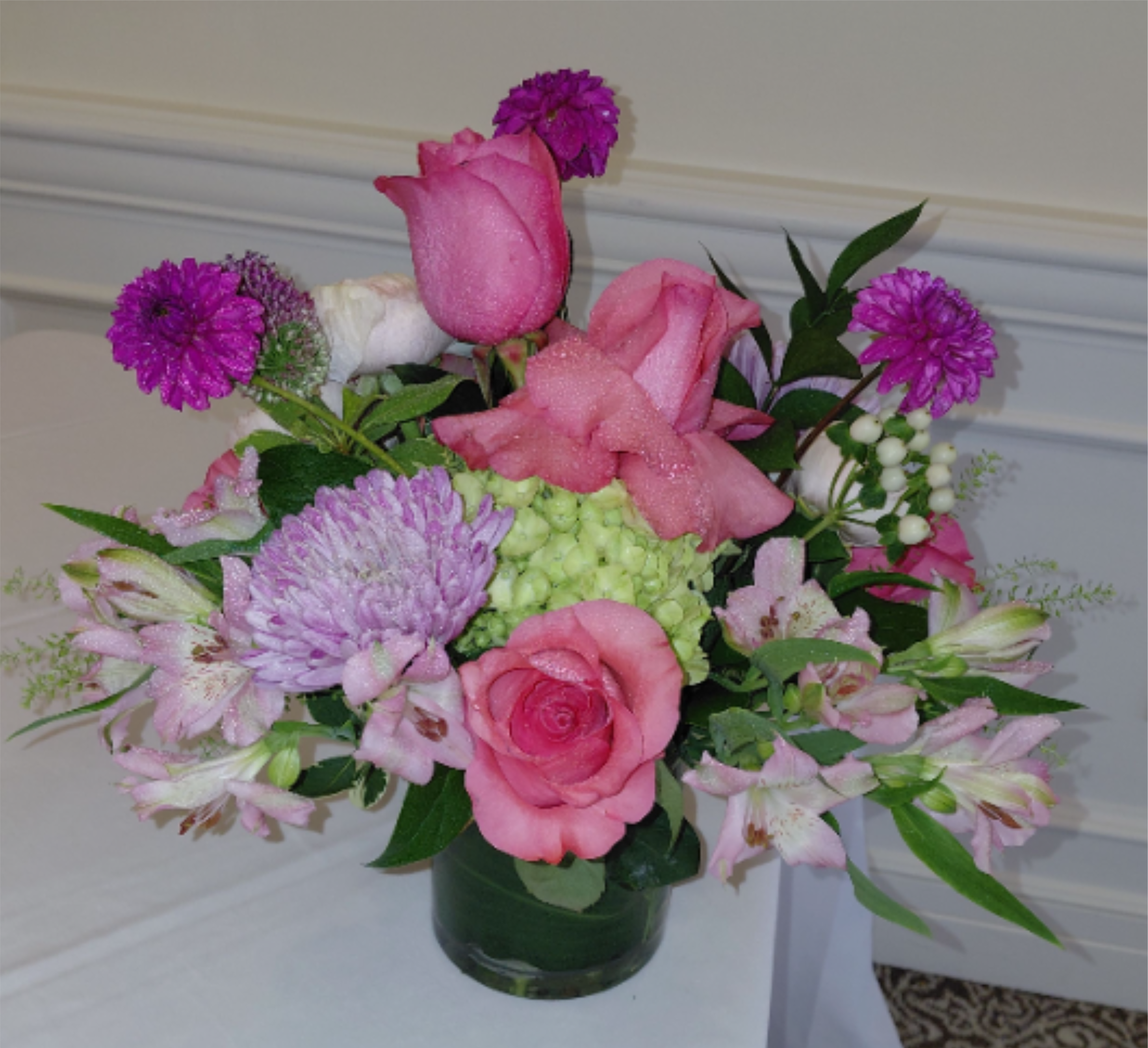 Blooms  Special Centerpiece - Roses, Hydrangea,  Cremons, Dahlias(Seasonal),  Astromeria, Hypericum, Ruscus, Fancy Greens