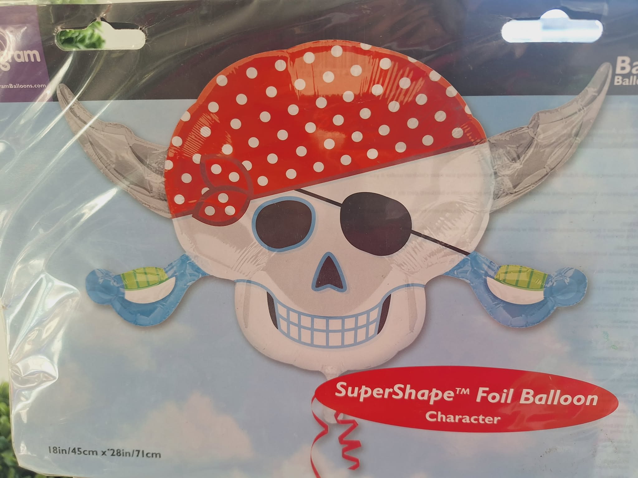 Pirate skull foil balloon in retail packaging