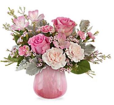 Darling Bloom - Sweet as can be, Teleflora's Darling Bloom Bouquet captures the soft side of love with pink roses, carnations, and alstroemeria arranged in a translucent crackled glass vase that fades into a lovely pink gradient-perfect for Valentine's Day.   Features pink roses, pink alstroemeria, pink carnations, pink miniature carnations, pink waxflower, dusty miller, and lemon leaf arranged in Teleflora's Sweet On Hue Vase, a translucent crackled glass vase with a pink gradient.