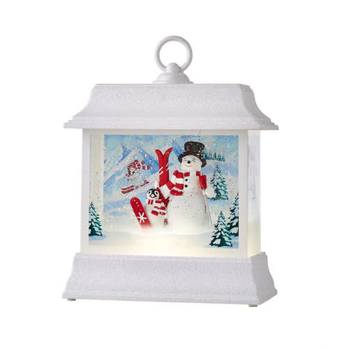 White holiday lantern with a snowman scene inside