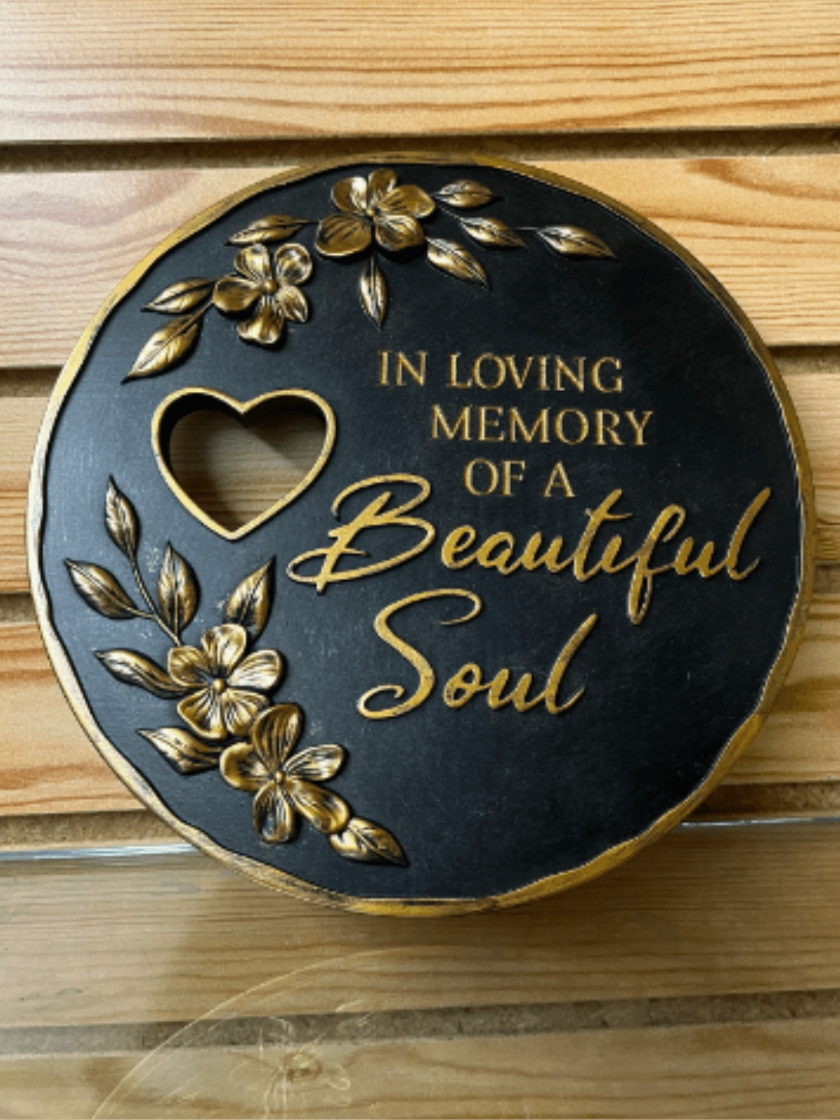 "Beautiful Soul" Golden Plaque - This black and gold plaque has floral detailing and a commemorating phrase: "In Loving Memory of a Beautiful Soul"