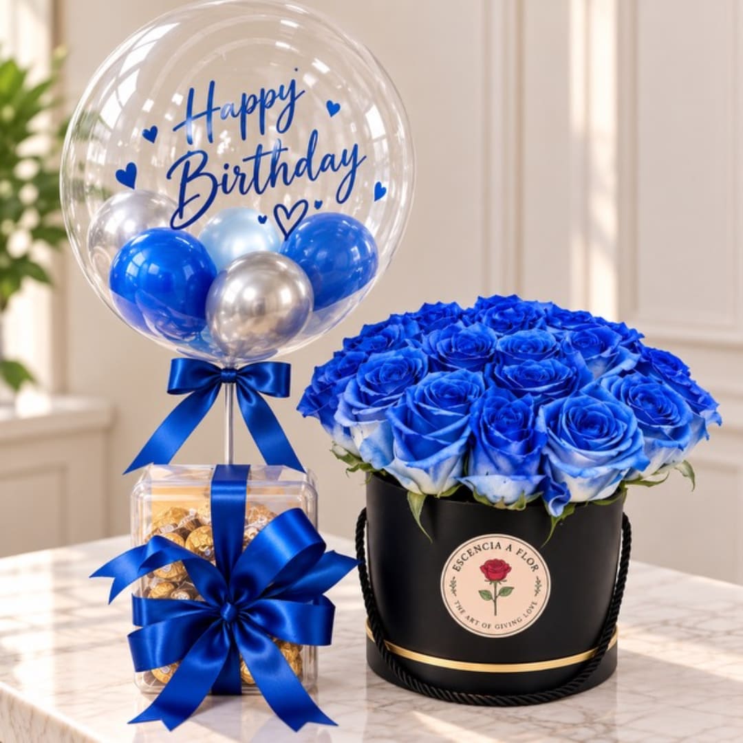 Blue roses in a black hat box with a birthday balloon and candy gift box