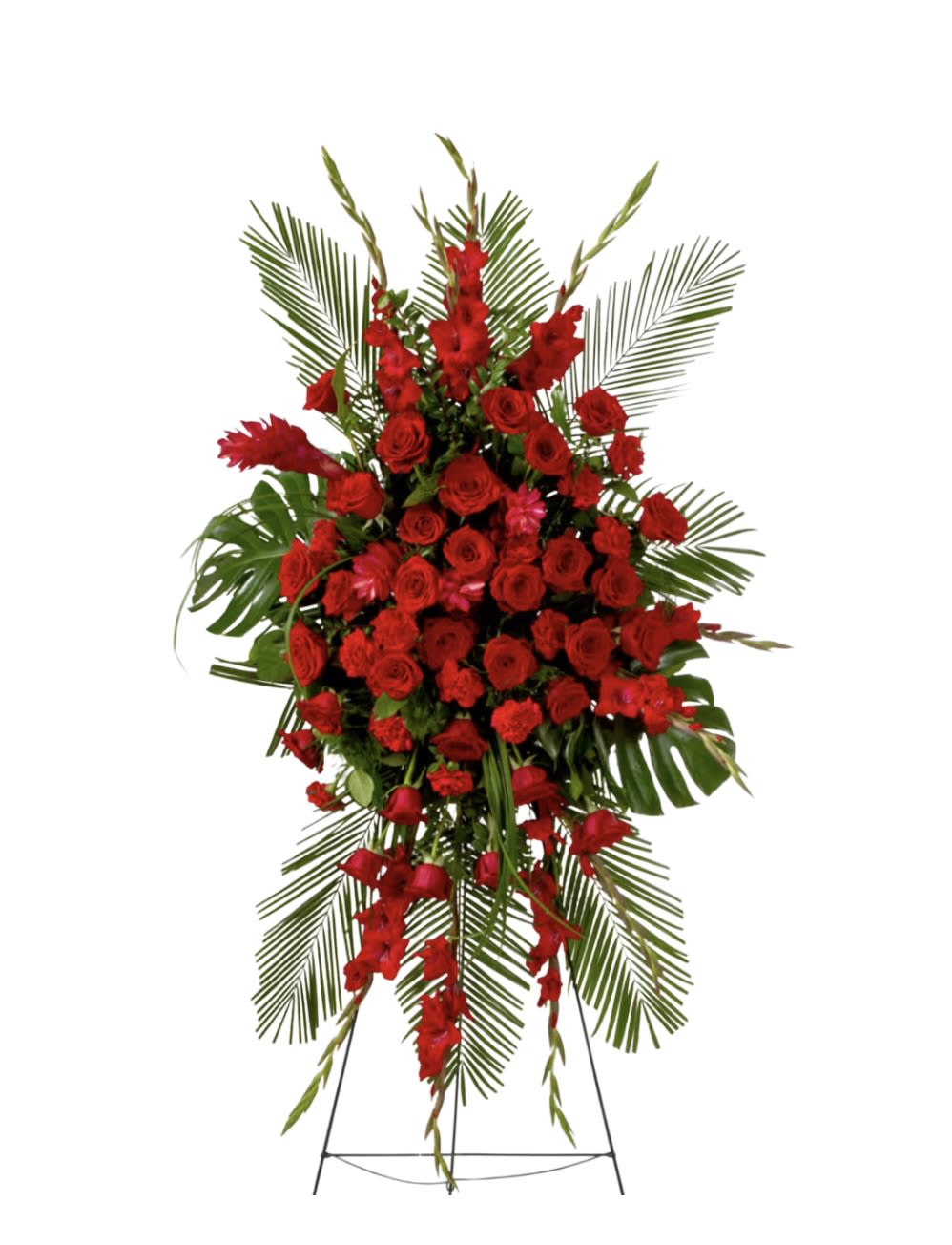Tall red rose standing spray on an easel with palm fronds