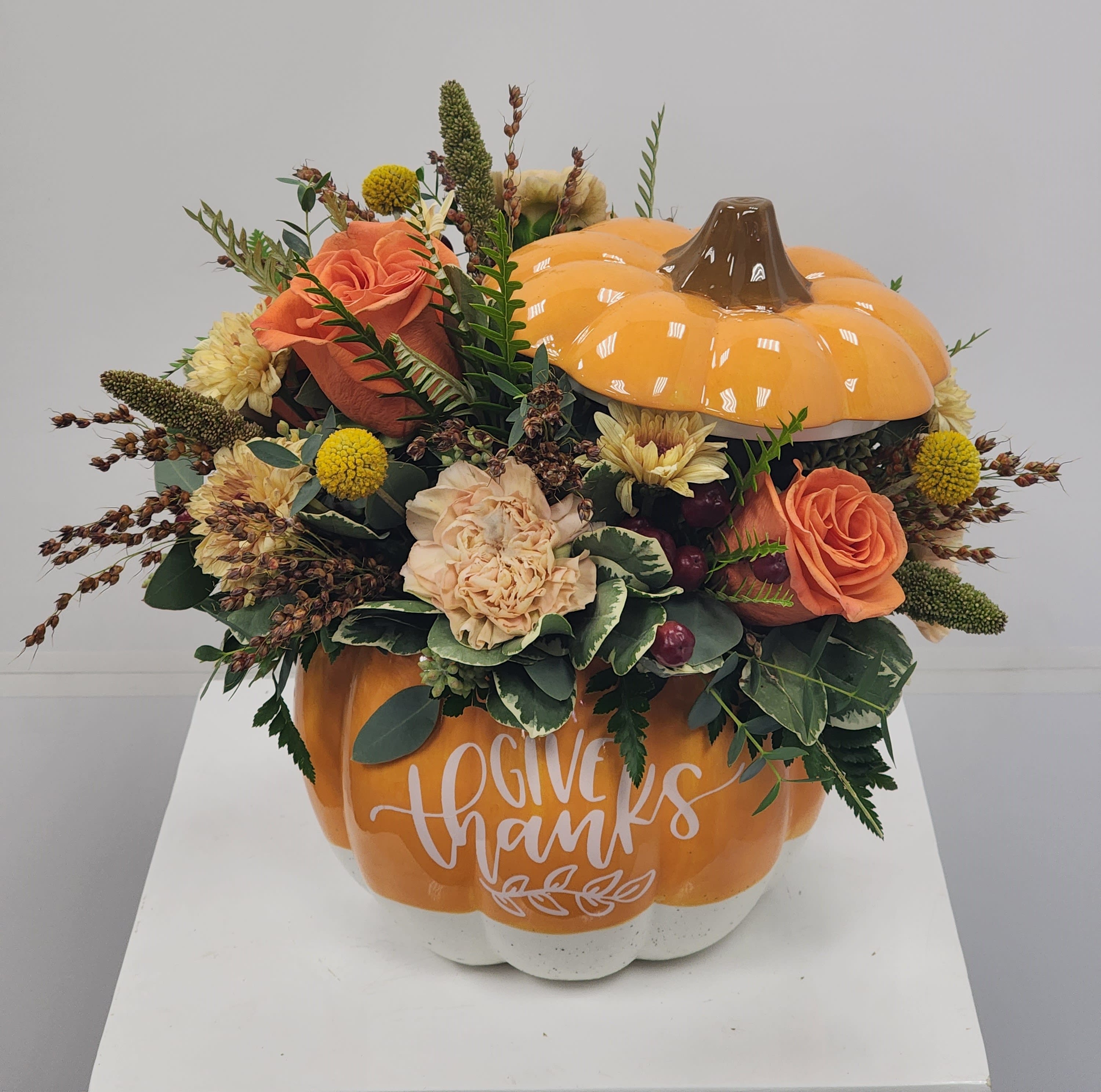Give Thanks Centerpiece - This adorable centerpiece comes in a keepsake cookie jar. How cute is that! Approximately 13" tall, 14" long, and 11" wide.