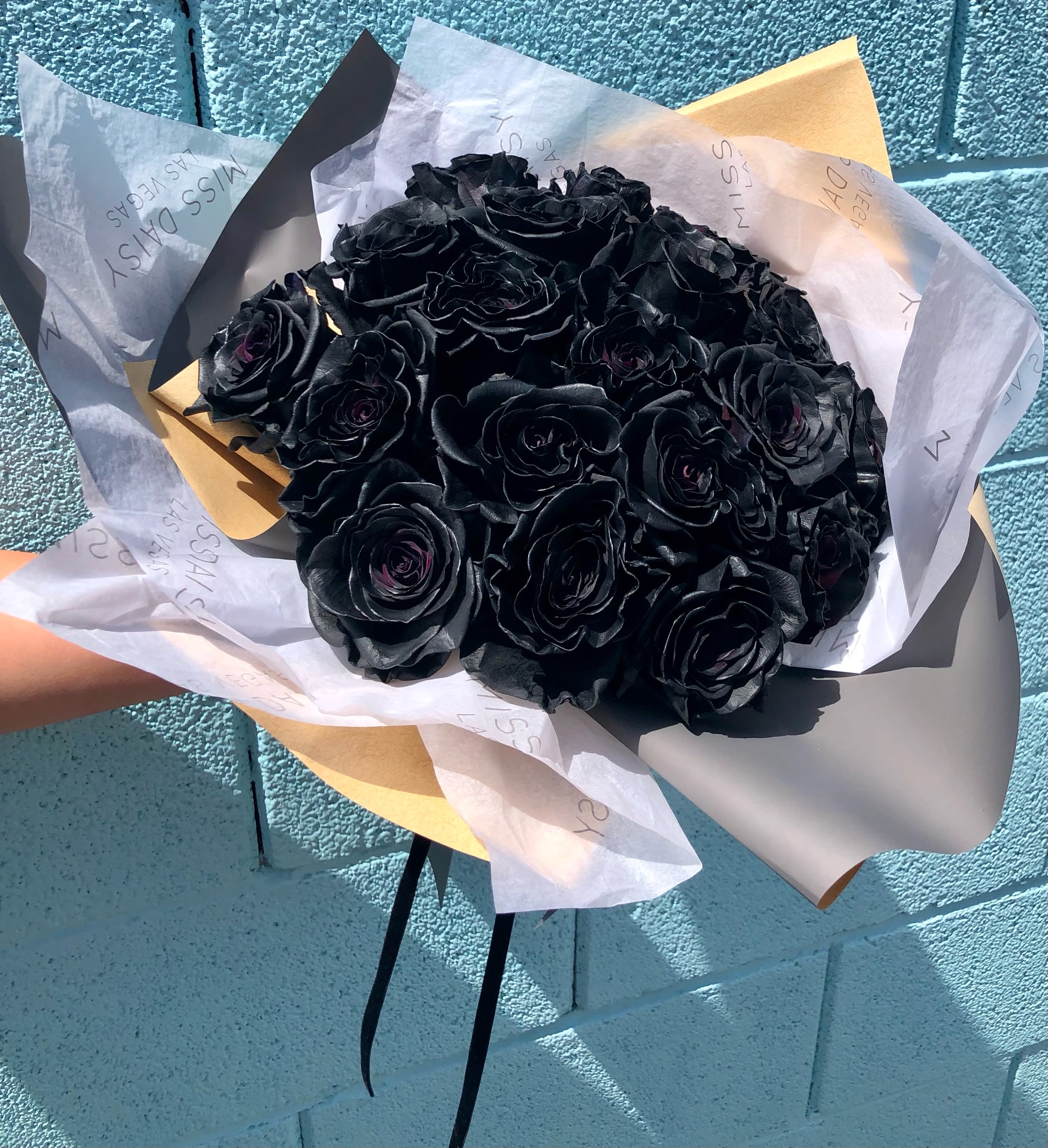 Black Magic  - Spooky season is here and we're here for it! These black magic roses are perfect in an arrangement or handtie and are sure to please even the darkest of hearts!  These are a special order item and require a 10 day lead for ordering. 