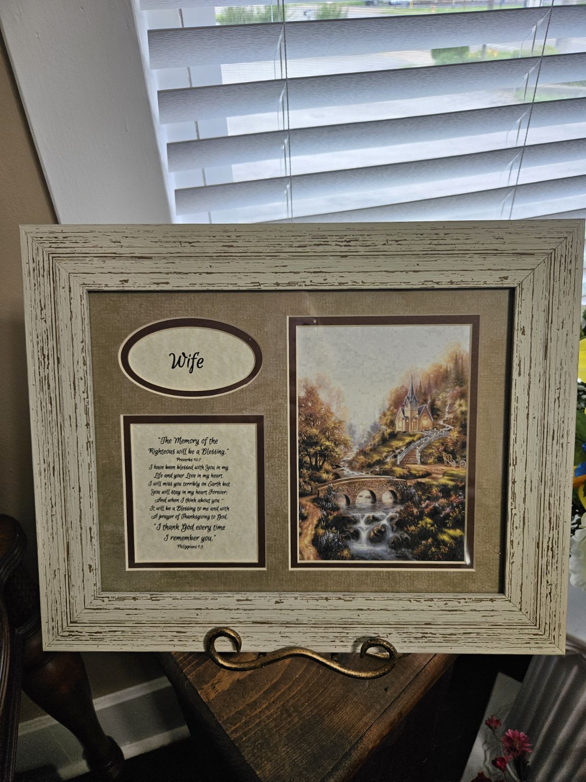 Framed memorial display with a landscape print and the word Wife
