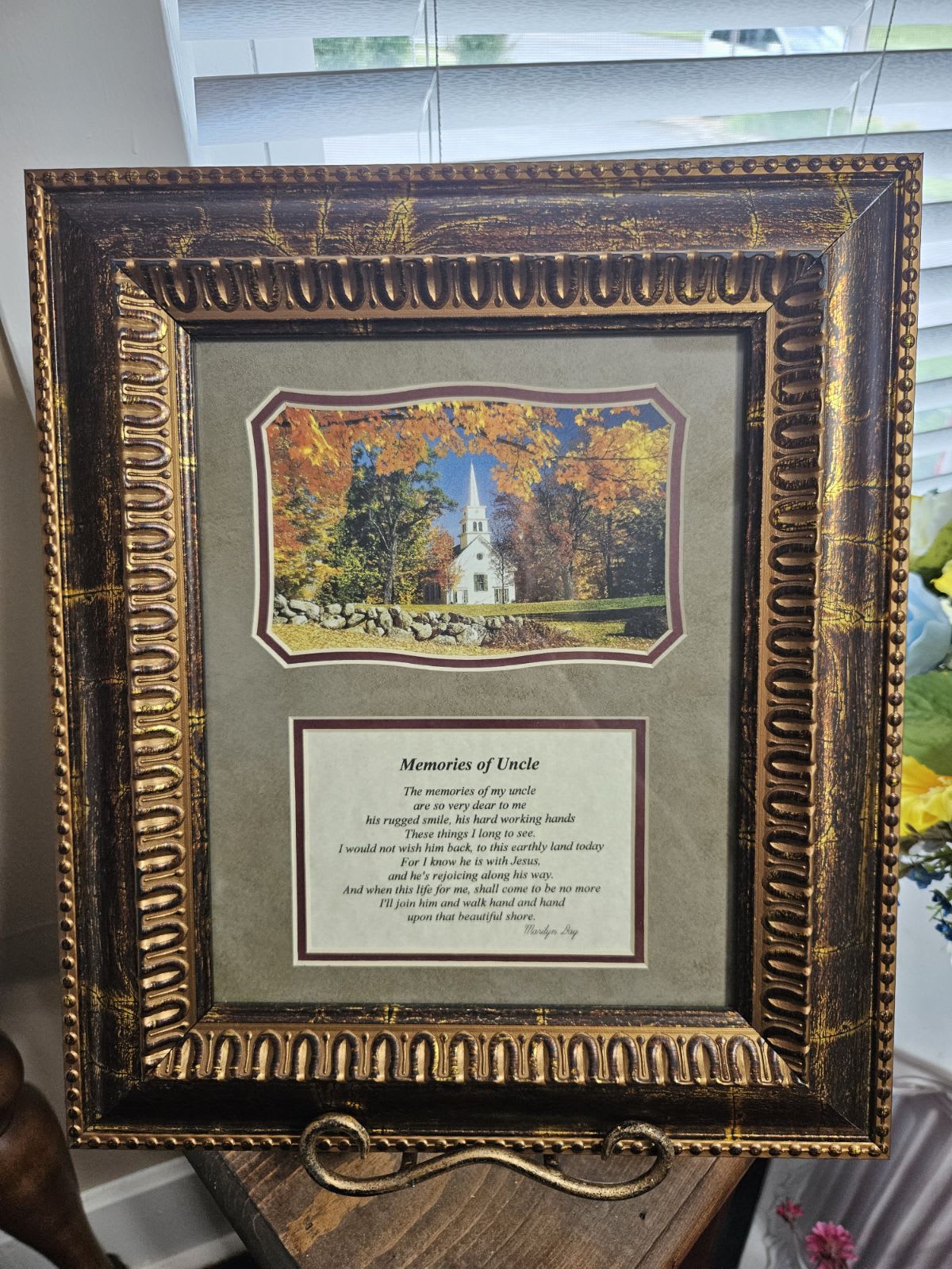 Framed memorial plaque with a church scene and poem for Uncle