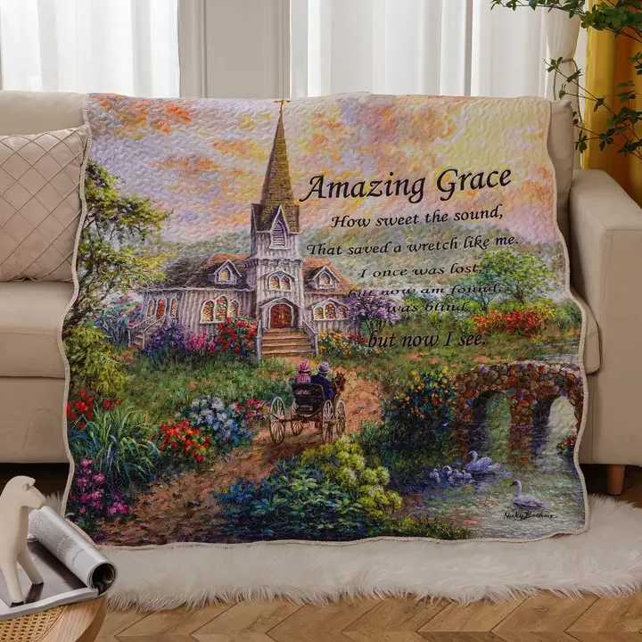Quilted throw blanket with a church scene and "Amazing Grace" text