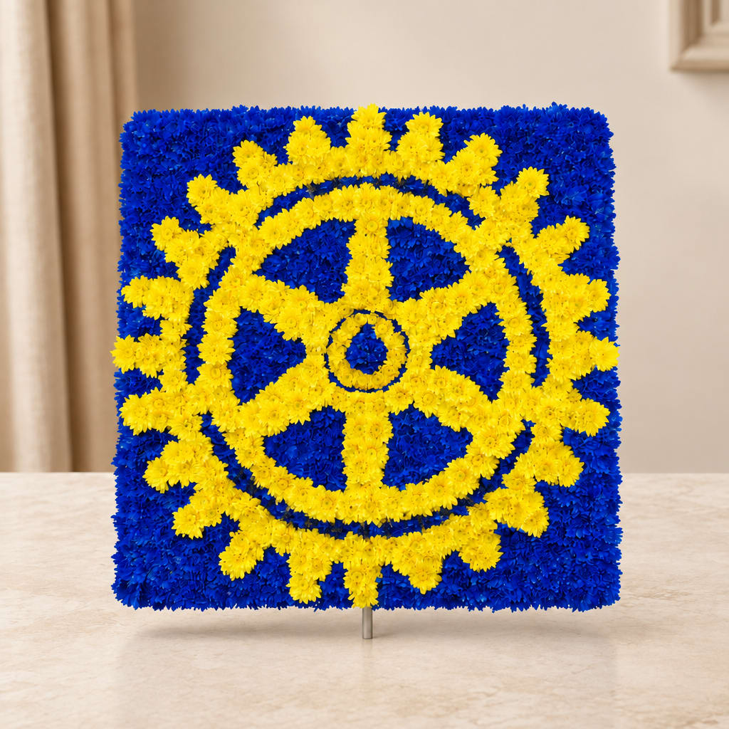 Square floral display in blue and yellow with a circular emblem design