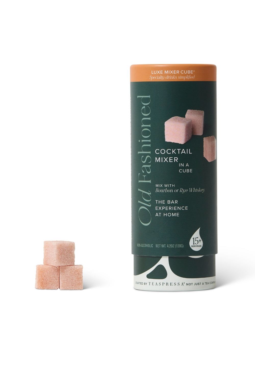 Cocktail mixer cubes in a cylindrical container with three cubes beside it