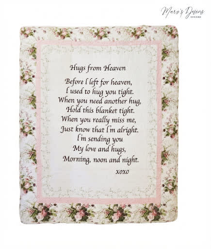 Floral memorial blanket with a printed poem and pink border