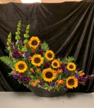 Boat of Sunflowers - Make someone's day with a boat of Sunflowers!