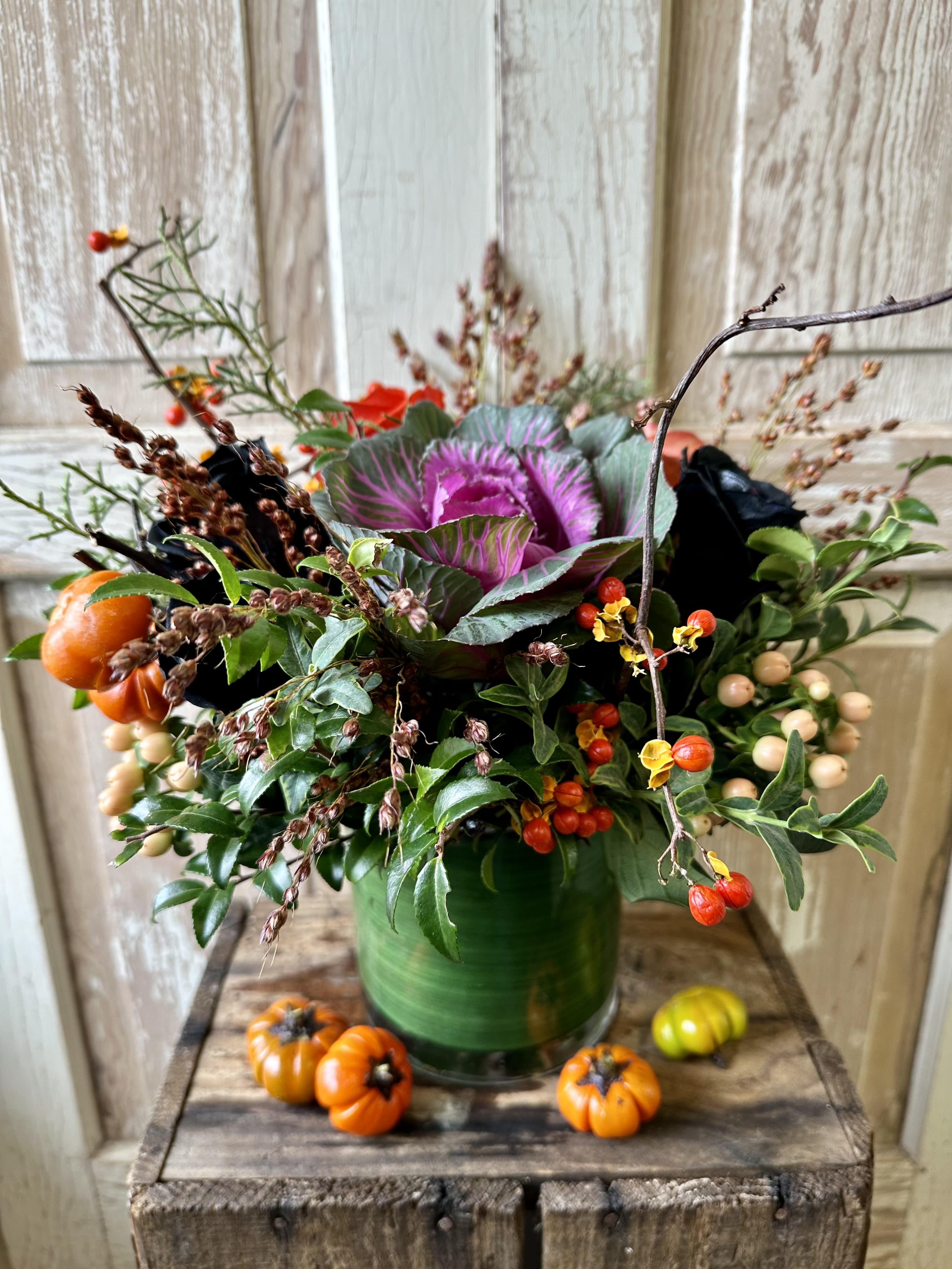 Witches Gathering  - Enjoy this seasonal arrangement of black roses, kale and autumnal accents.
