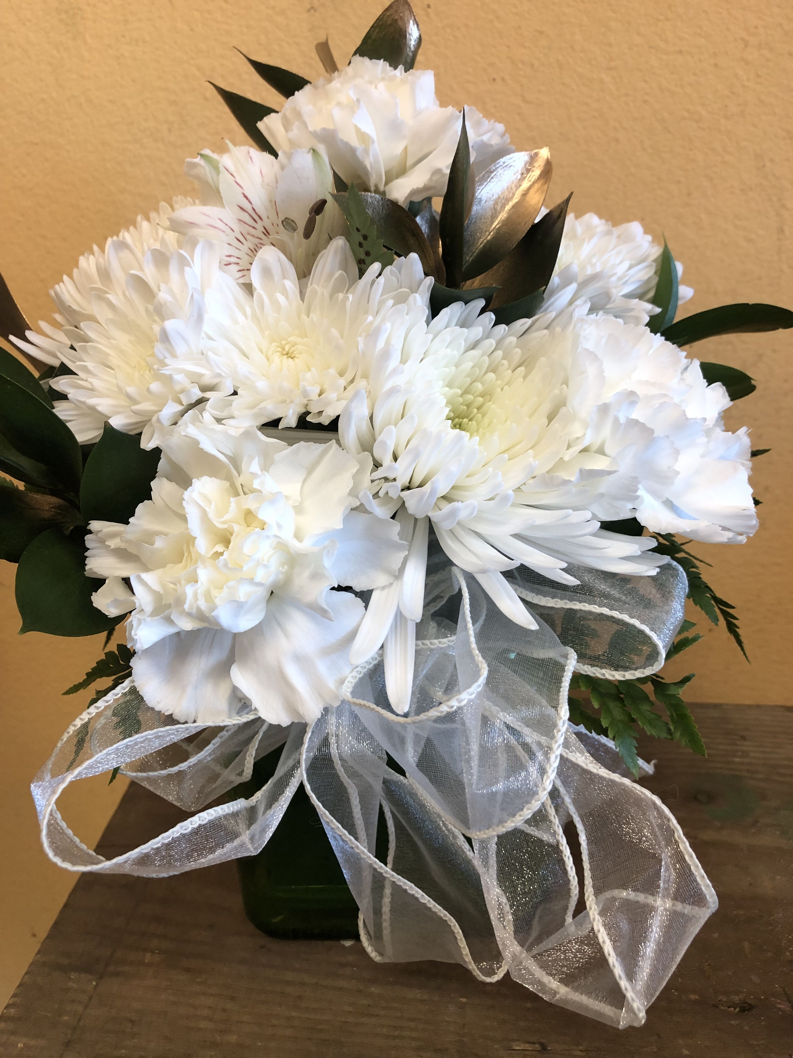 White chrysanthemum and carnation bouquet with a sheer ribbon bow