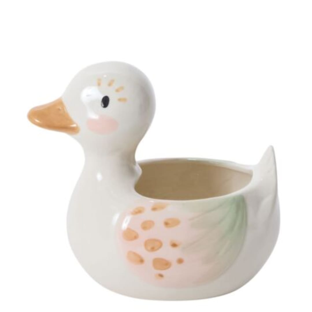 Ducky Pot - Every springtime display or baby shower needs a little Ducky Pot. This playful novelty ceramic duck is ideal for a small bunch of florals or a 3-inch drop-in plant. A glossy finish and hand painted details on the wing, face, and beak creates a precious design, perfect as a keepsake gift for a new mom and forever display in a baby's room. 5.75"x 4.25"x 5.75"