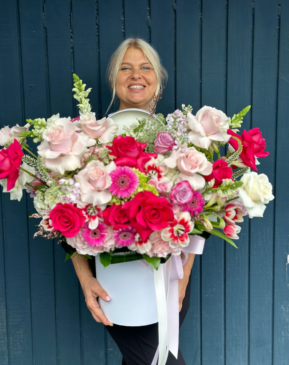 Large bouquet of pink and white roses with gerbera daisies in a white box