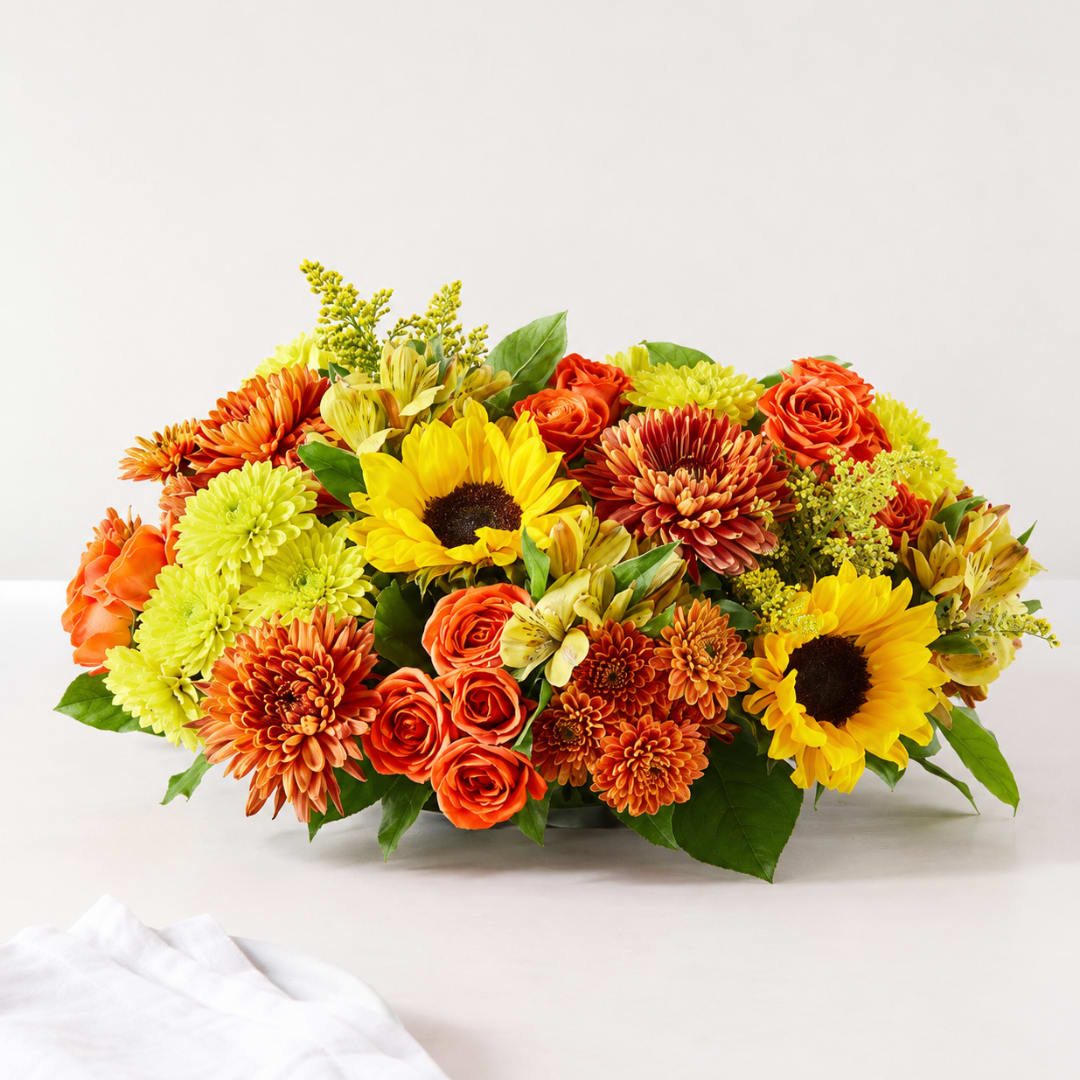 Orange and yellow mixed bouquet with sunflowers and chrysanthemums