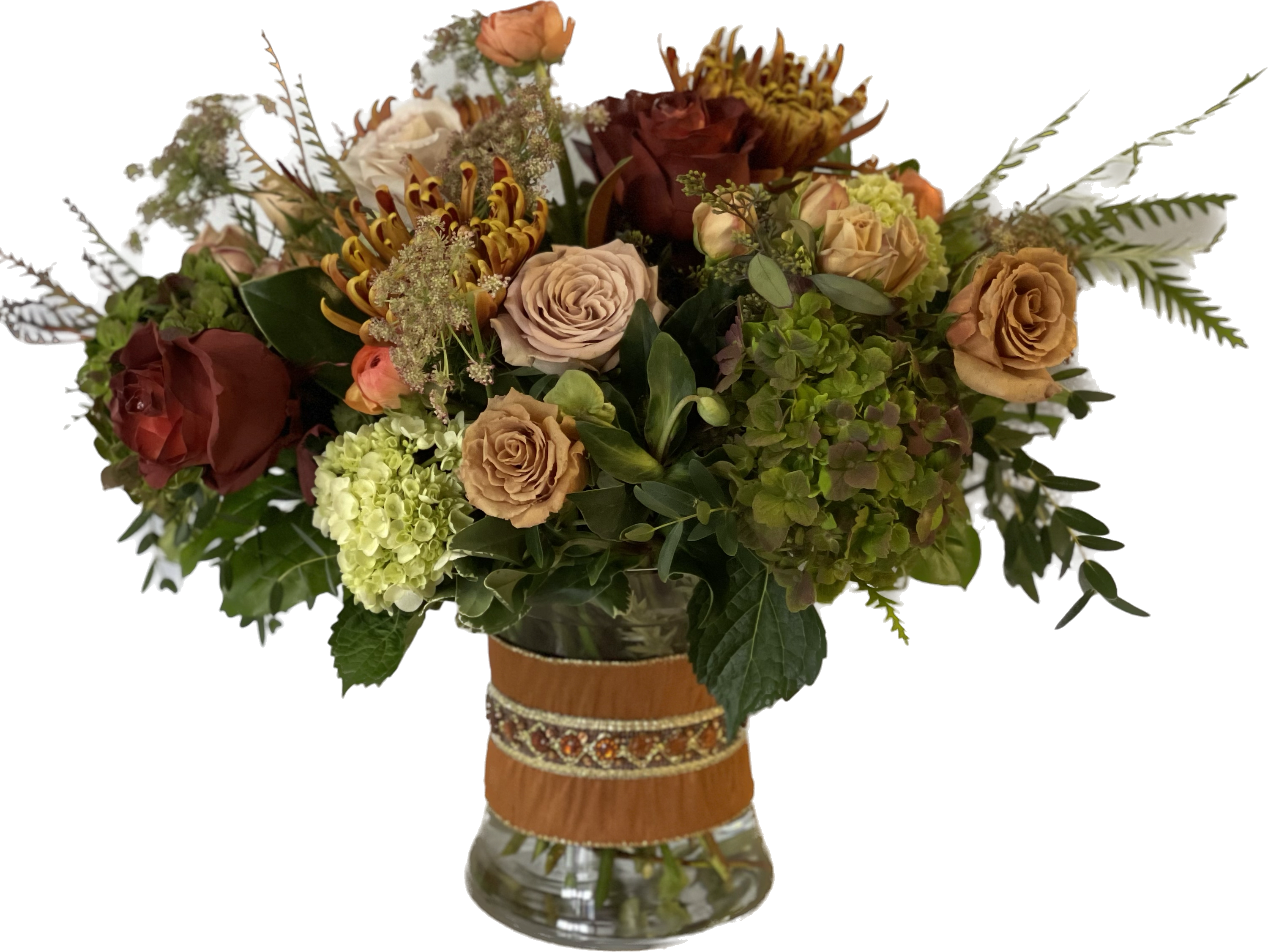 Mixed bouquet of roses and hydrangeas in a glass vase