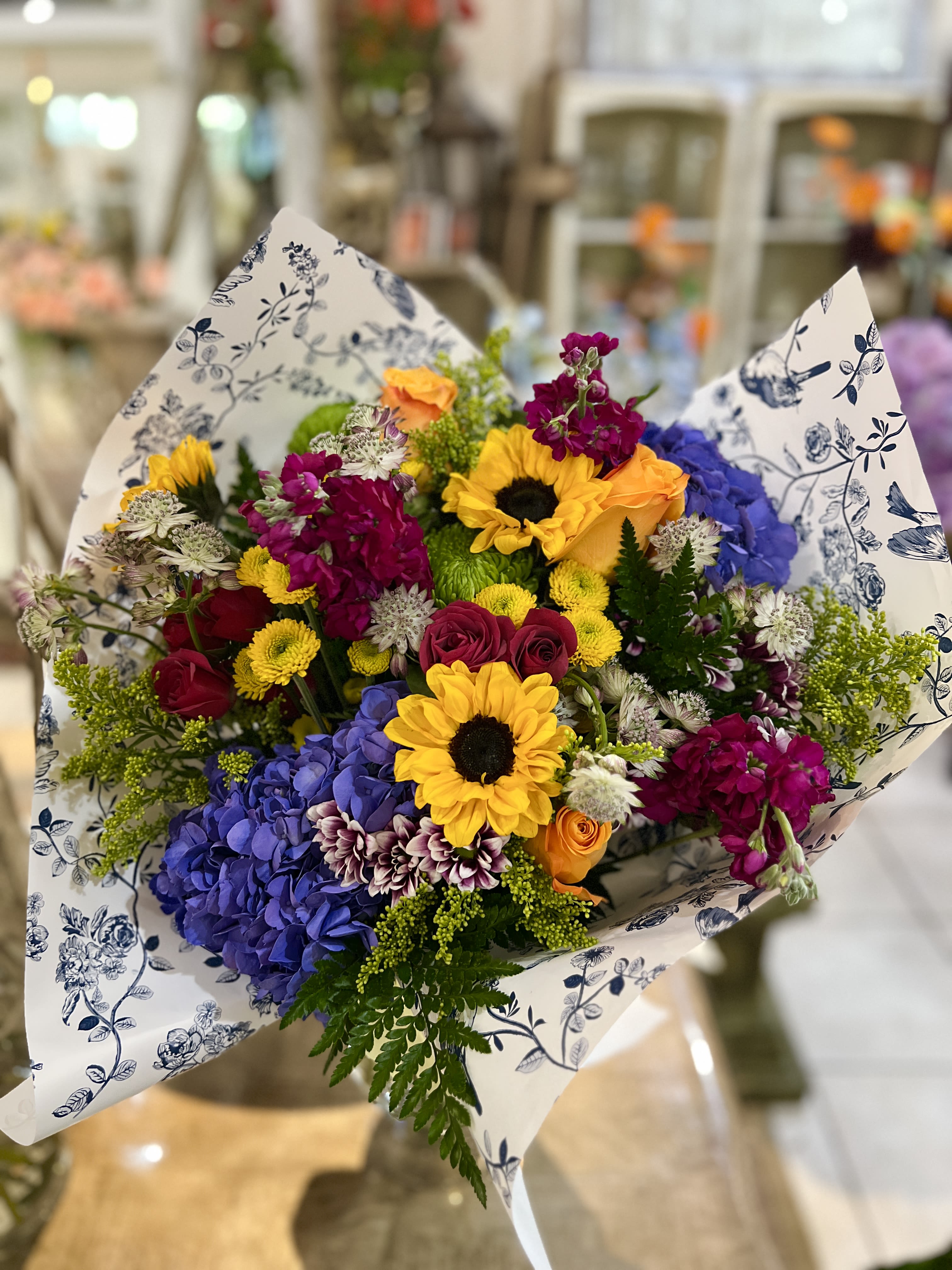 Premium Seasonal Handtied Bouquet - Pickup Only. - We will create a beautiful hand-tied wrapped bouquet with the freshest seasonal flowers! The picture is a sample bouquet.  Your bouquet may have different flowers in different colors, based on seasonal availability.