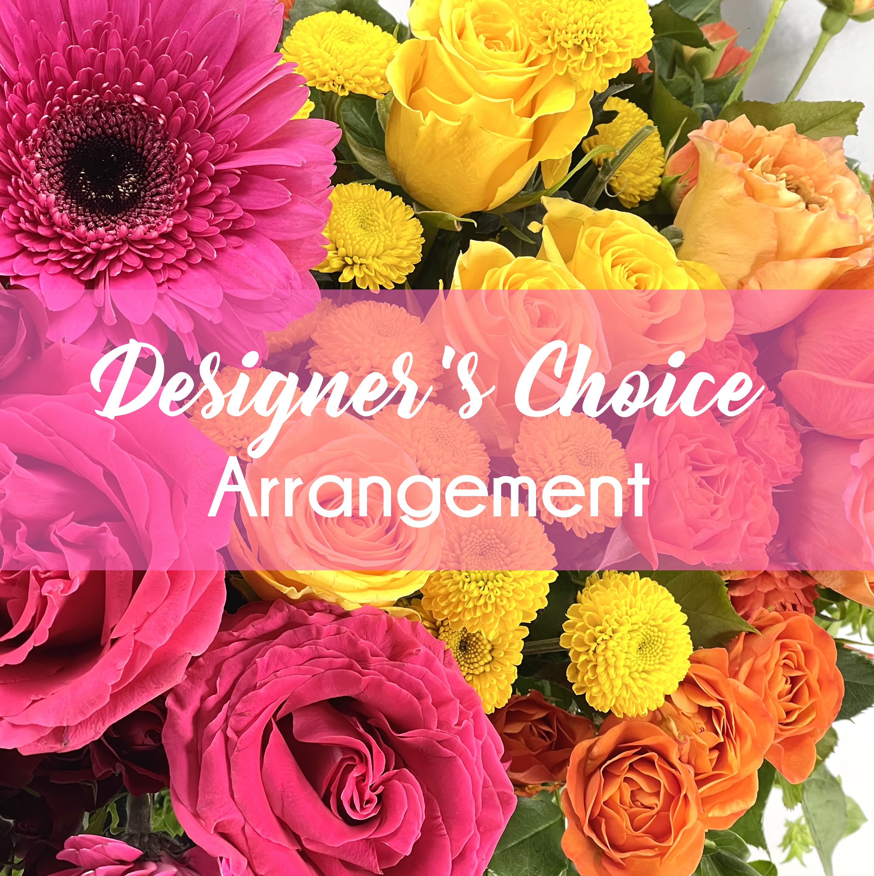 Bright mix of pink, yellow, and orange roses with a pink gerbera daisy and text reading Designer's Choice Arrangement