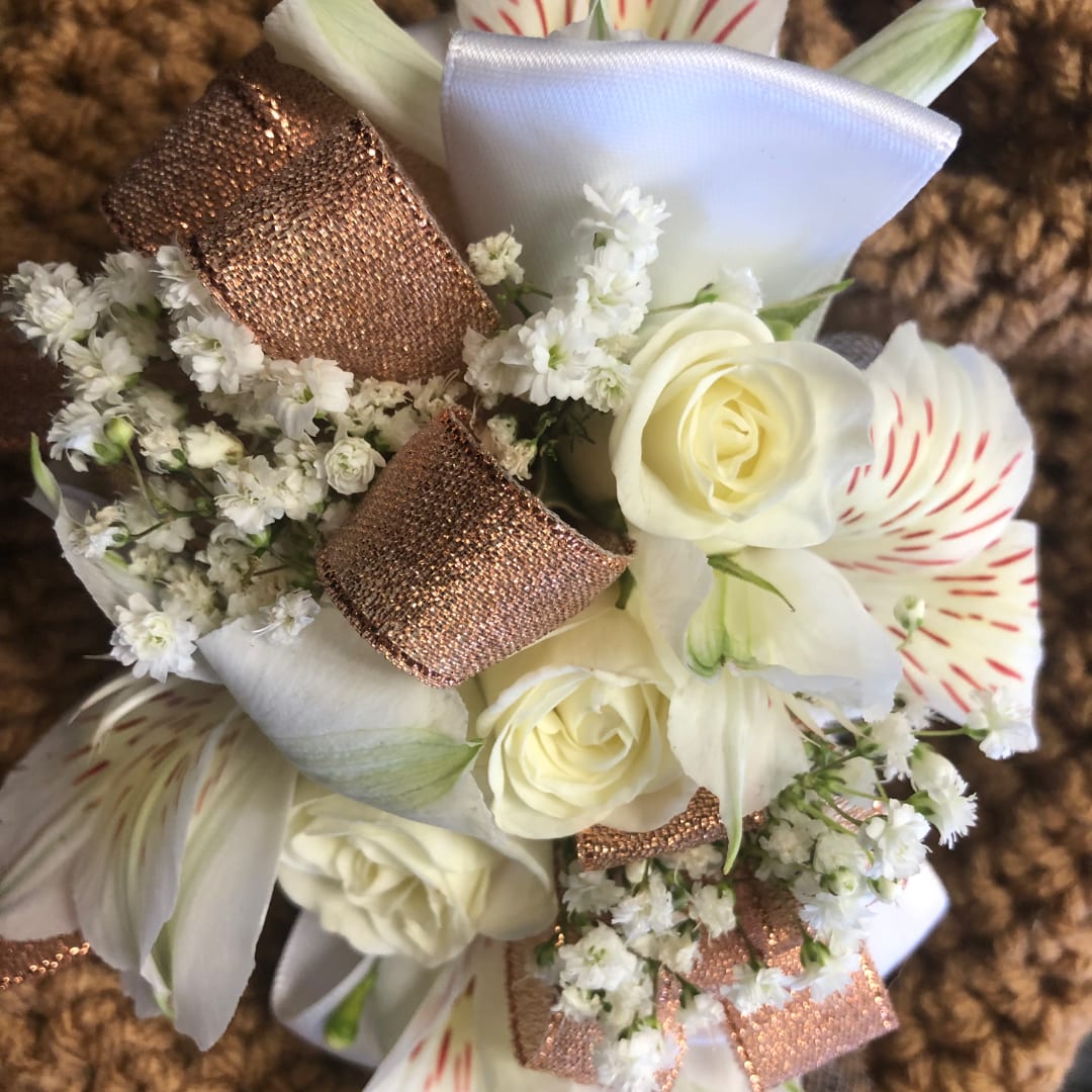 Bouquet of white roses and striped white flowers with copper ribbon