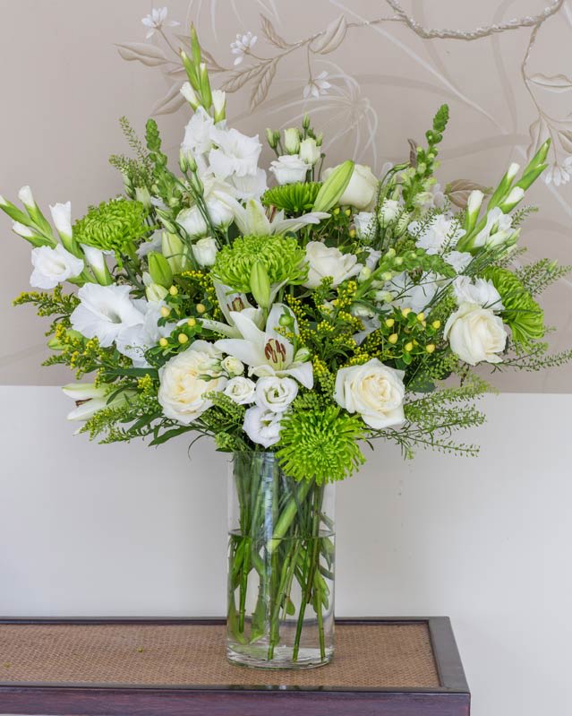 Simplicity &amp; Elegant Arrangement - Vibrant limes, subtle whites and creams provide a dynamic contrast for this elegant classic. Our clients really love the simplicity of this popular arrangement.