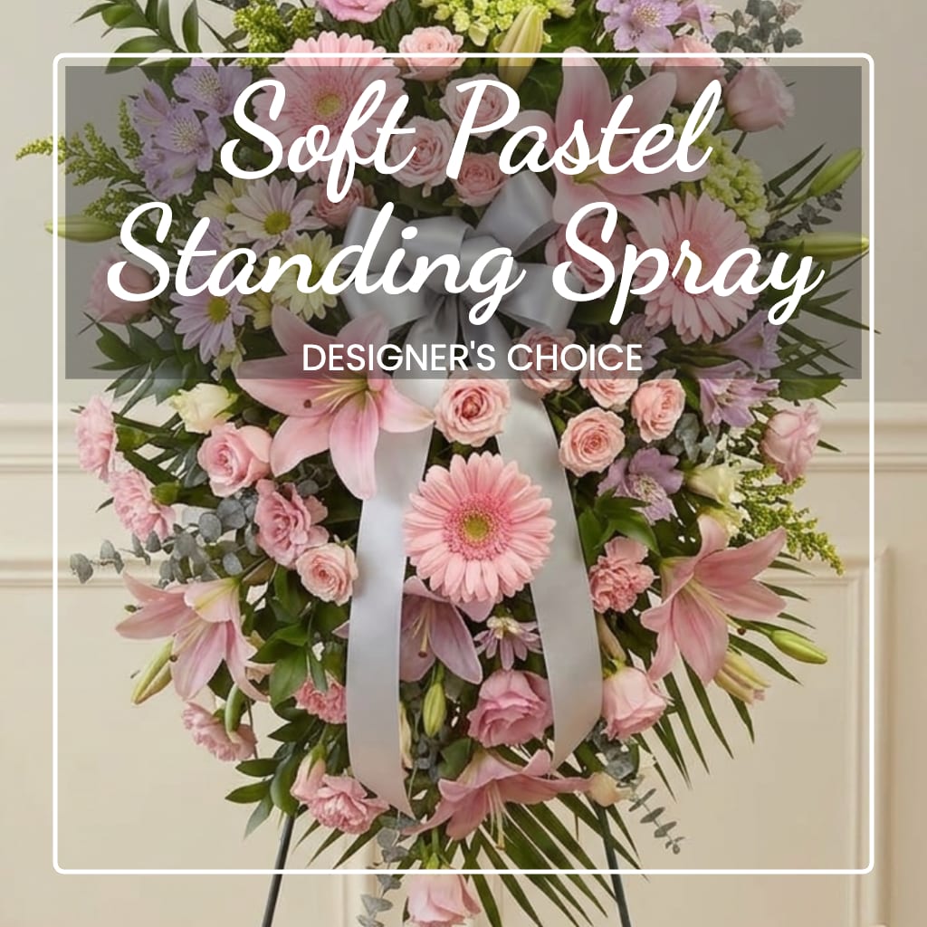 Pink and white standing spray with a ribbon bow