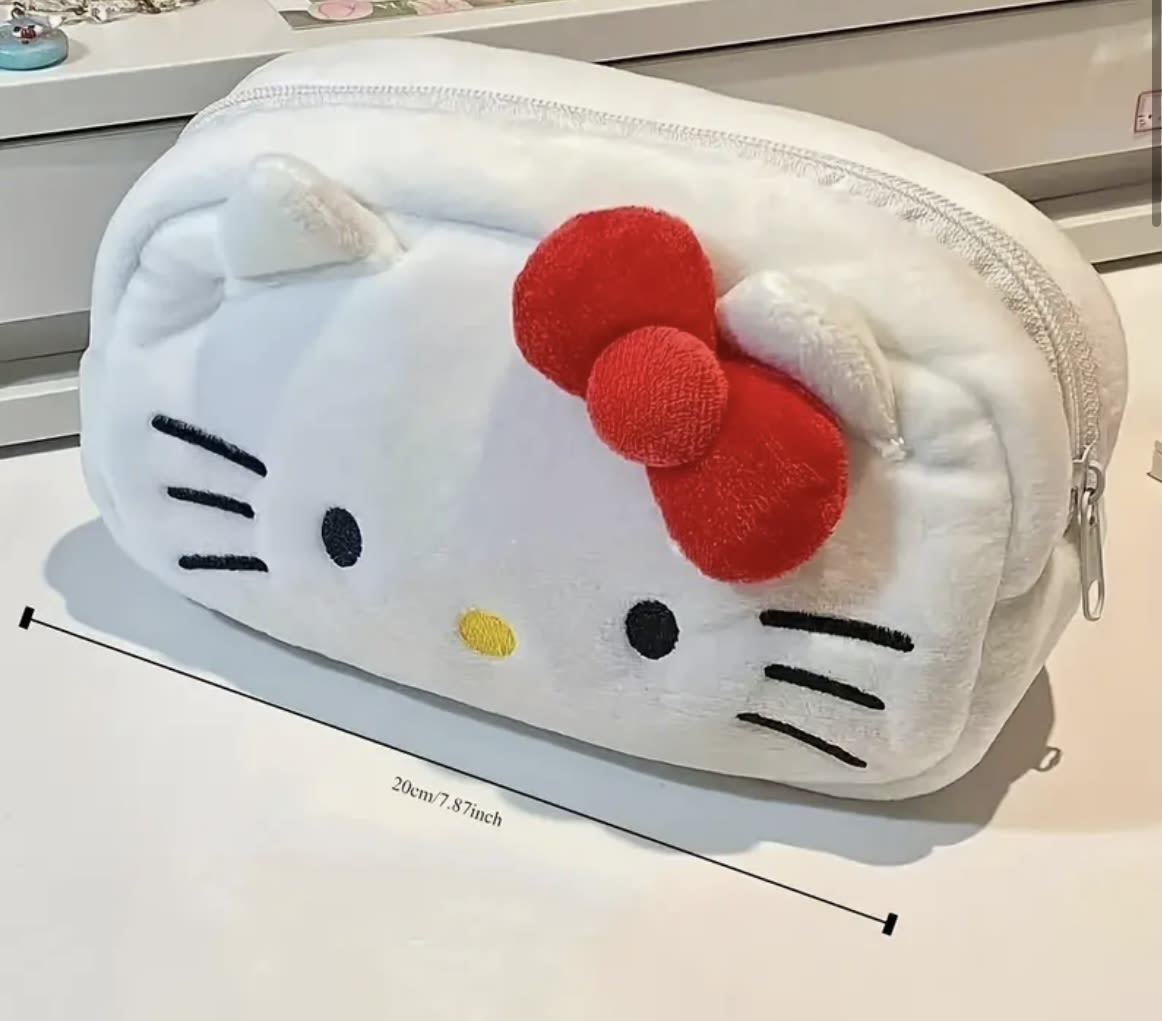 Hello Kitty-shaped zippered pouch with a red bow