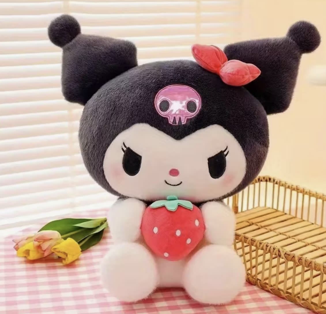 Plush character holding a strawberry with a small flower beside it