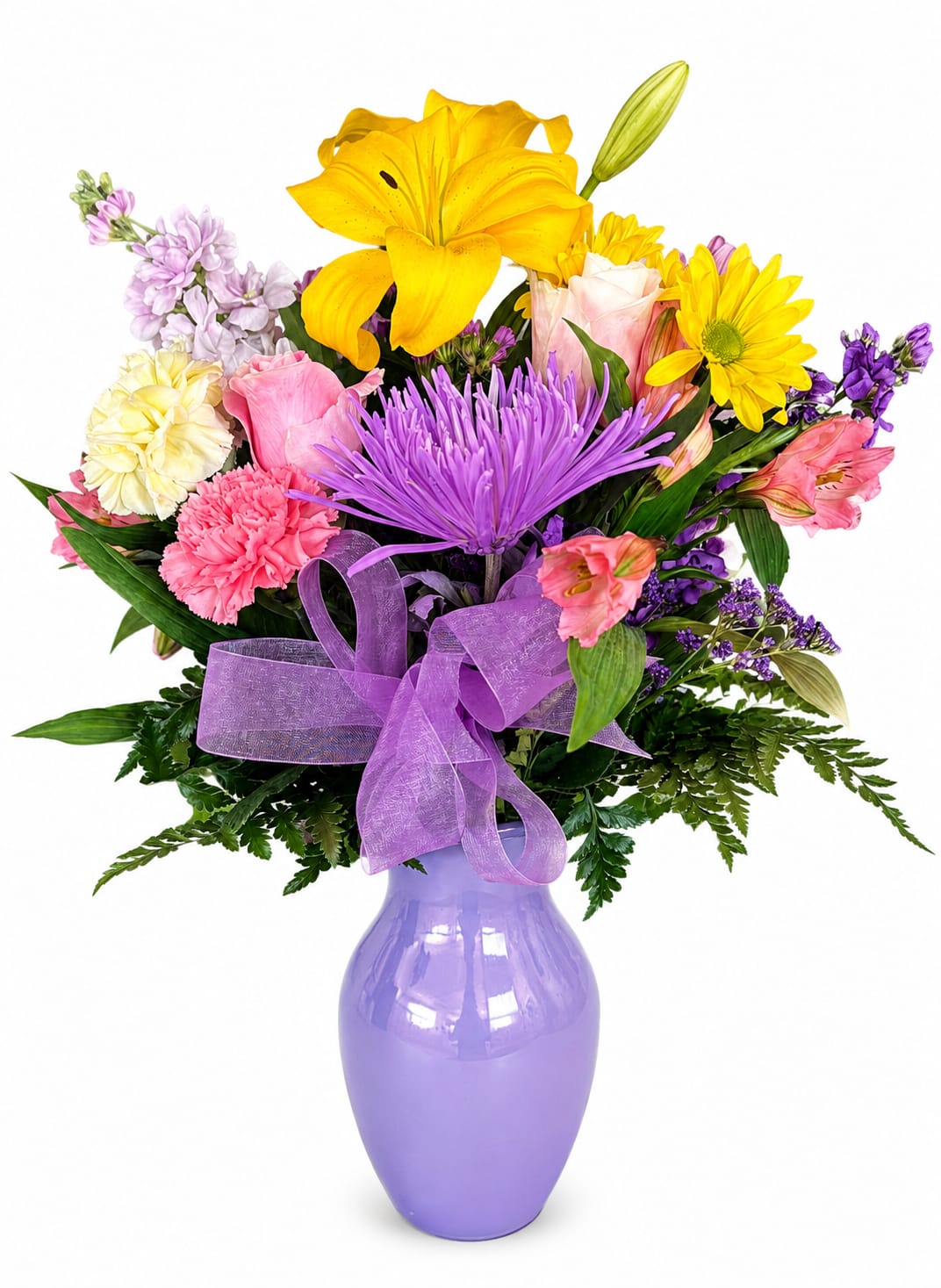 Colorful bouquet with lilies, roses, and daisies in a purple vase