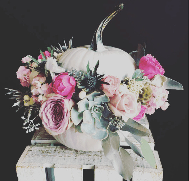 Summers Harvest Pumpkin - Pumpkin filled with beautiful summer blossoms including blush roses , light green succulents, light blue thistle and pops of hot pink roses  * Premium Option Shown*
