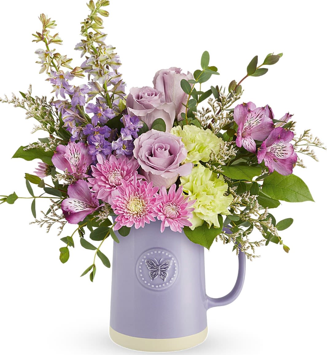 Teleflora's Pops of Pastel Bouquet - Indulge Mom's love for artisanal charm with our glazed ceramic pitcher, featuring a delicate embossed butterfly and a natural base, perfect for presenting fresh blooms that'll enchant her year-round.