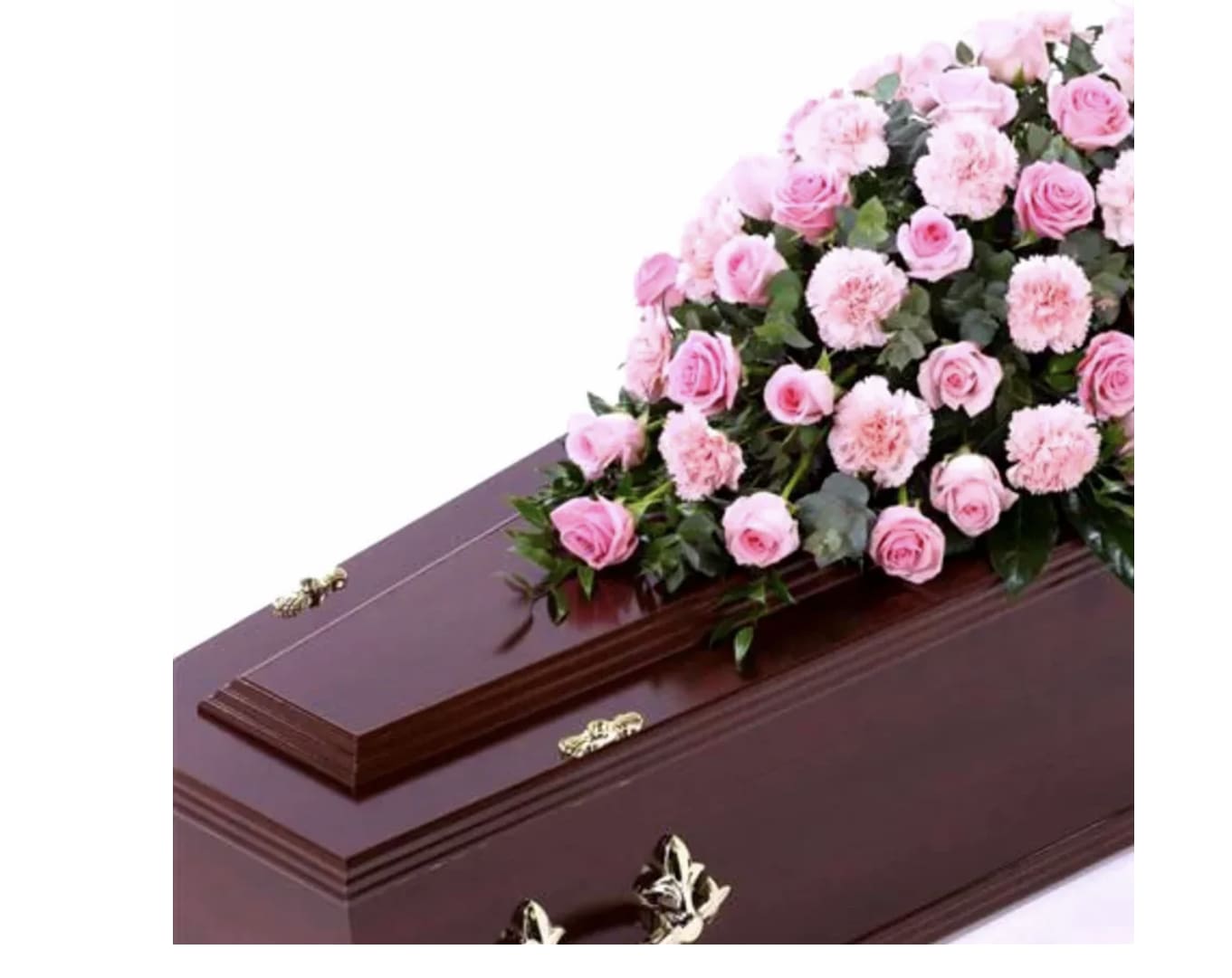 Pink roses and carnations arranged on a casket