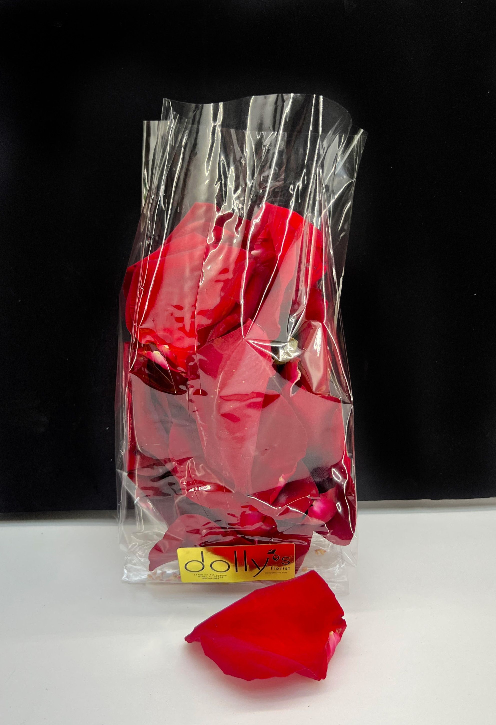 Wrapped red rose petals in clear plastic packaging