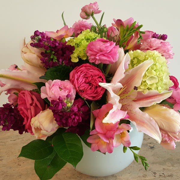 A gorgeous mix of favorites! This lush full arrangement includes pink oriental