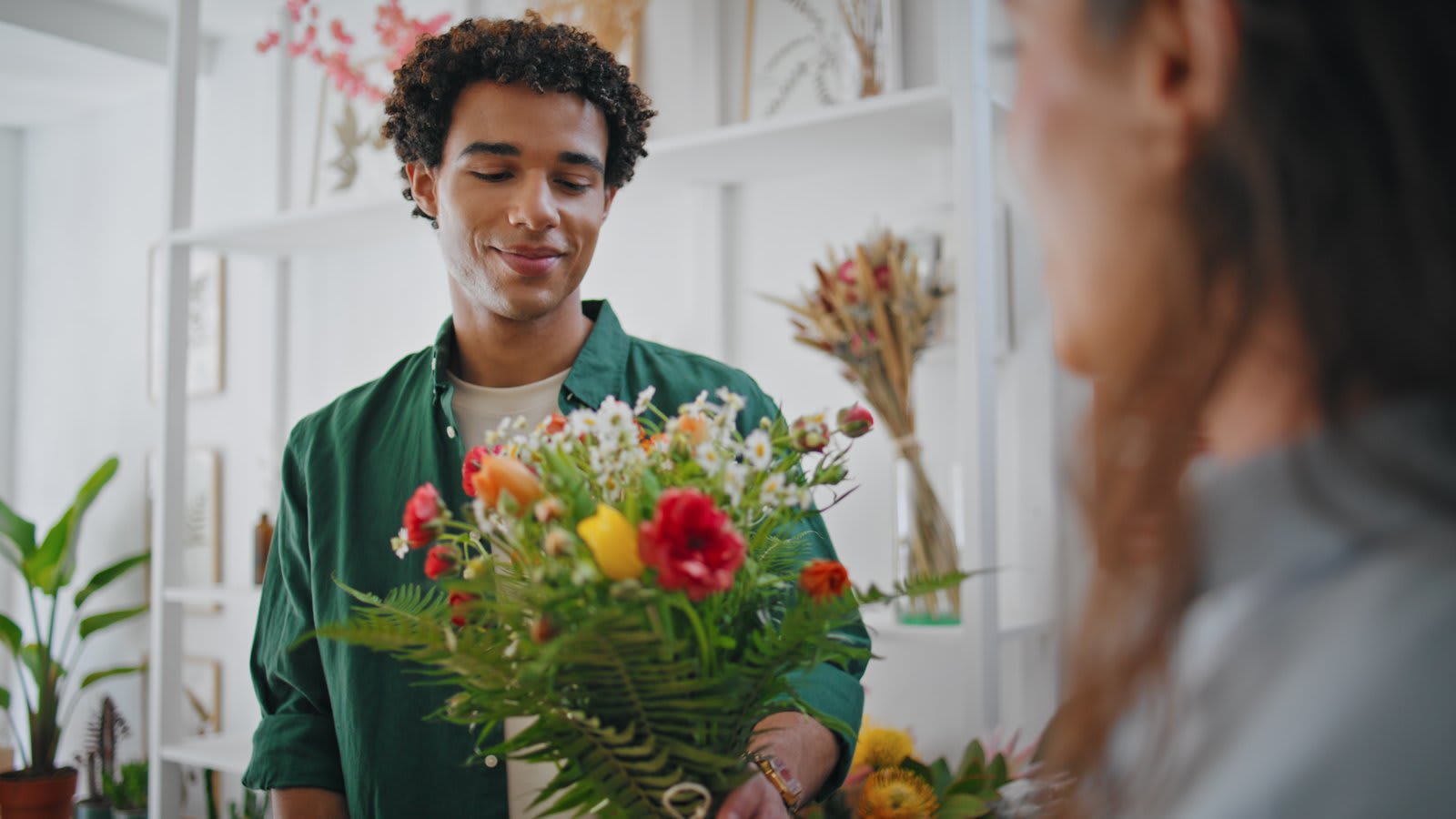 Local florist preparing a flower arrangement