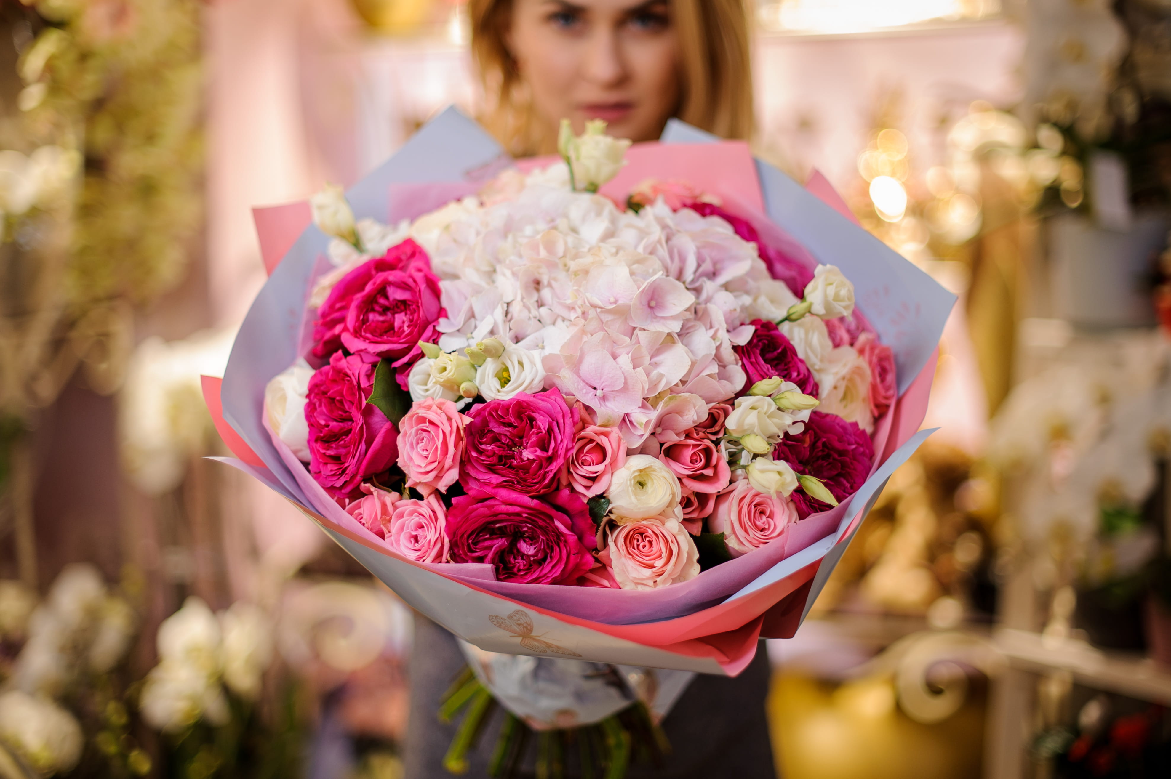 100 red roses delivered in Houston by Floral Concepts