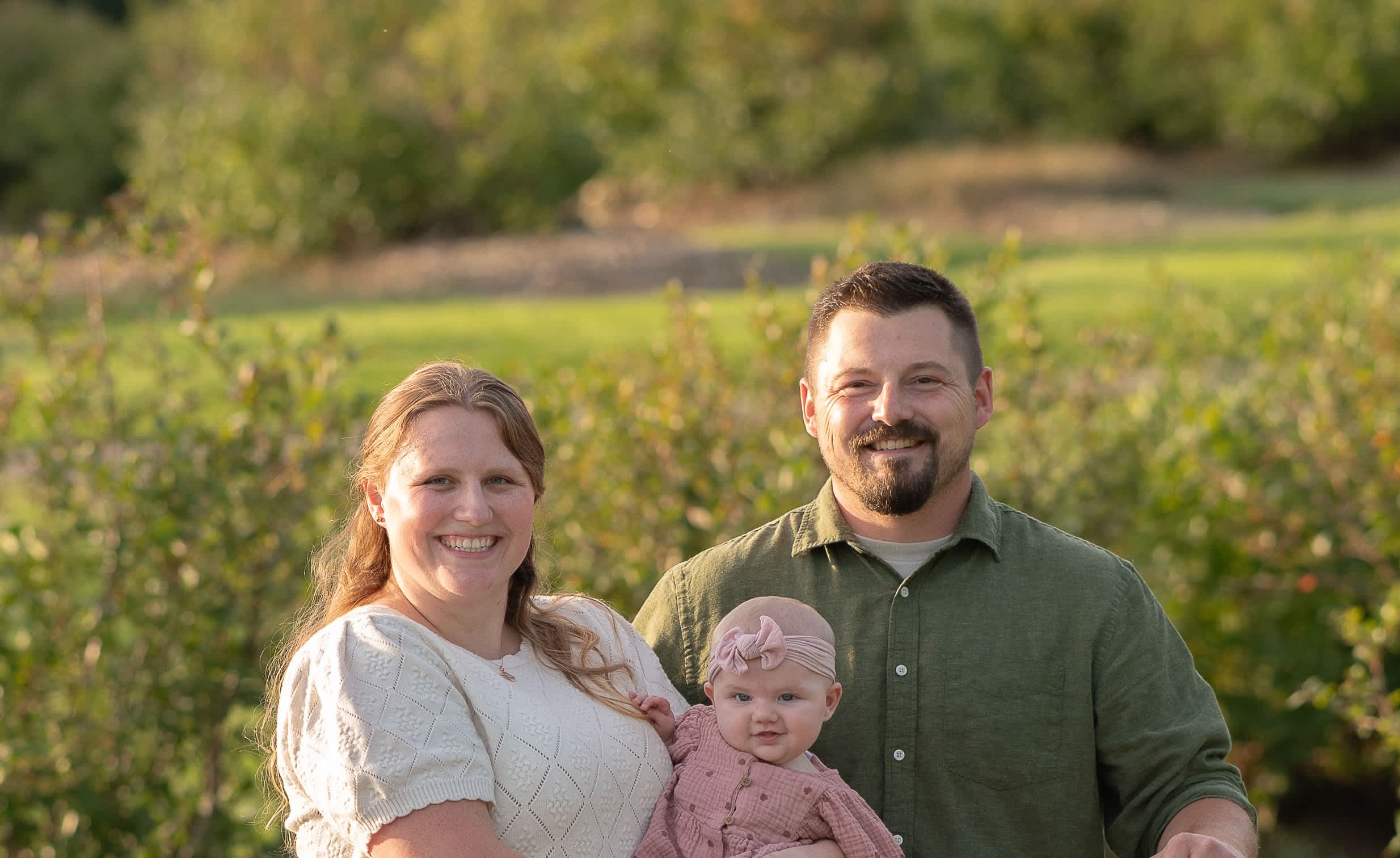 Evelyn and her family outdoors