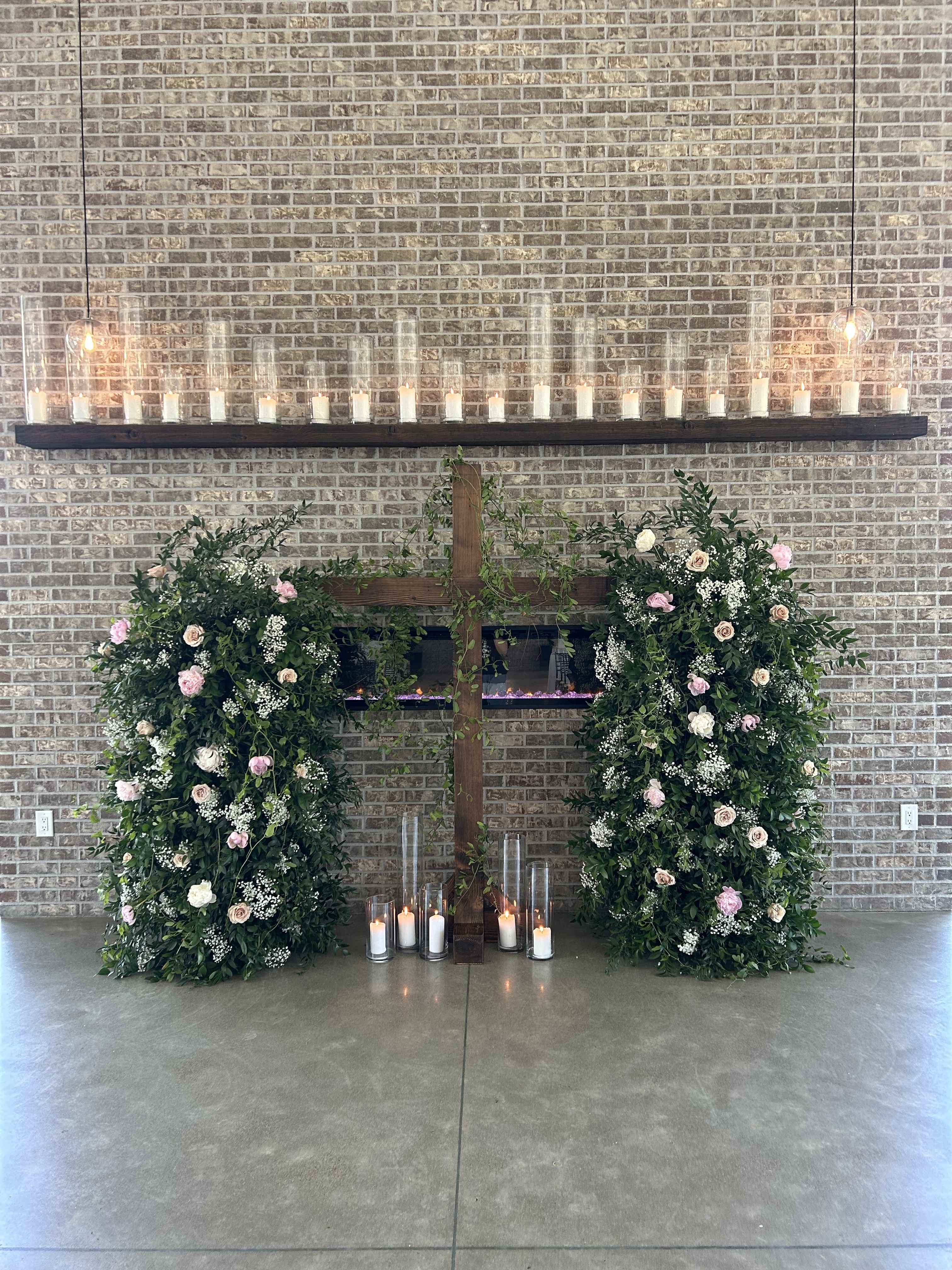 Cross Arch & Cylinder Rentals with Flower Decor