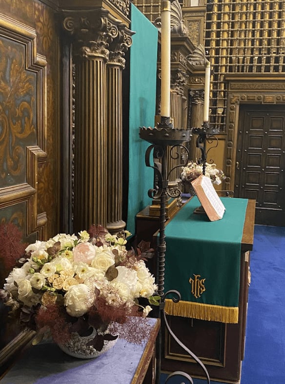 Funeral floral arrangement on a table