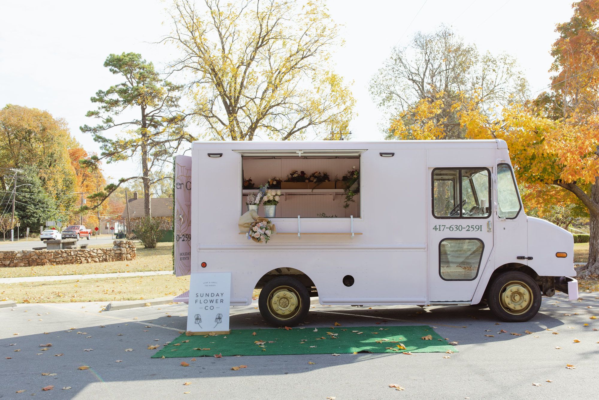 Photo of a flower truck named Mirabelle, white and ice-cream truck shaped