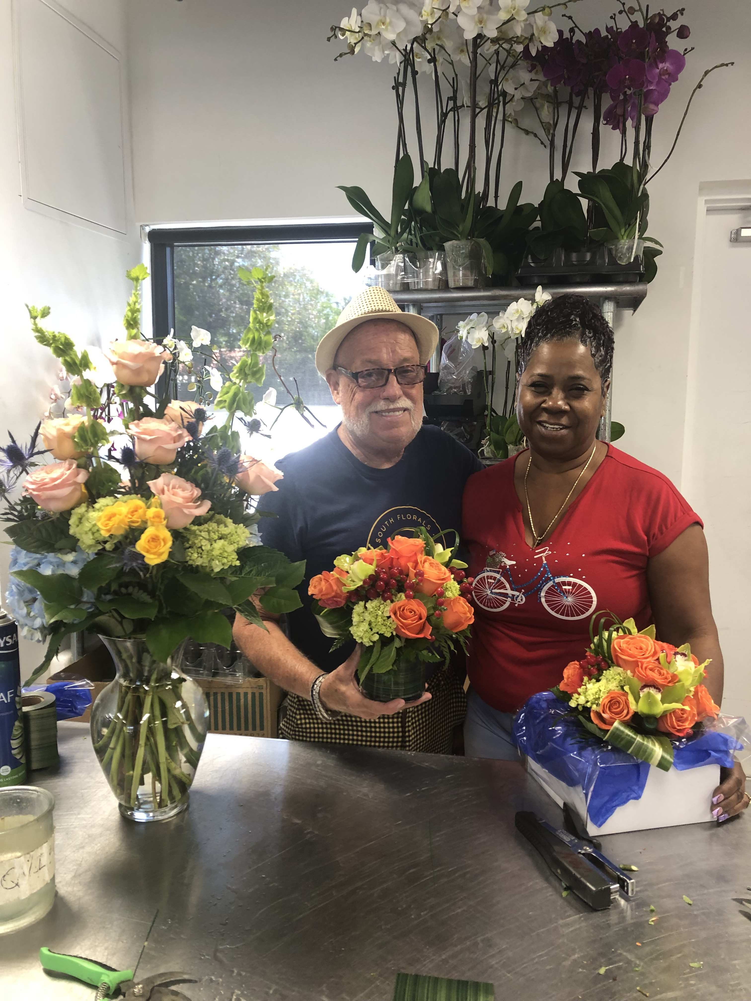 pairs working on flowers